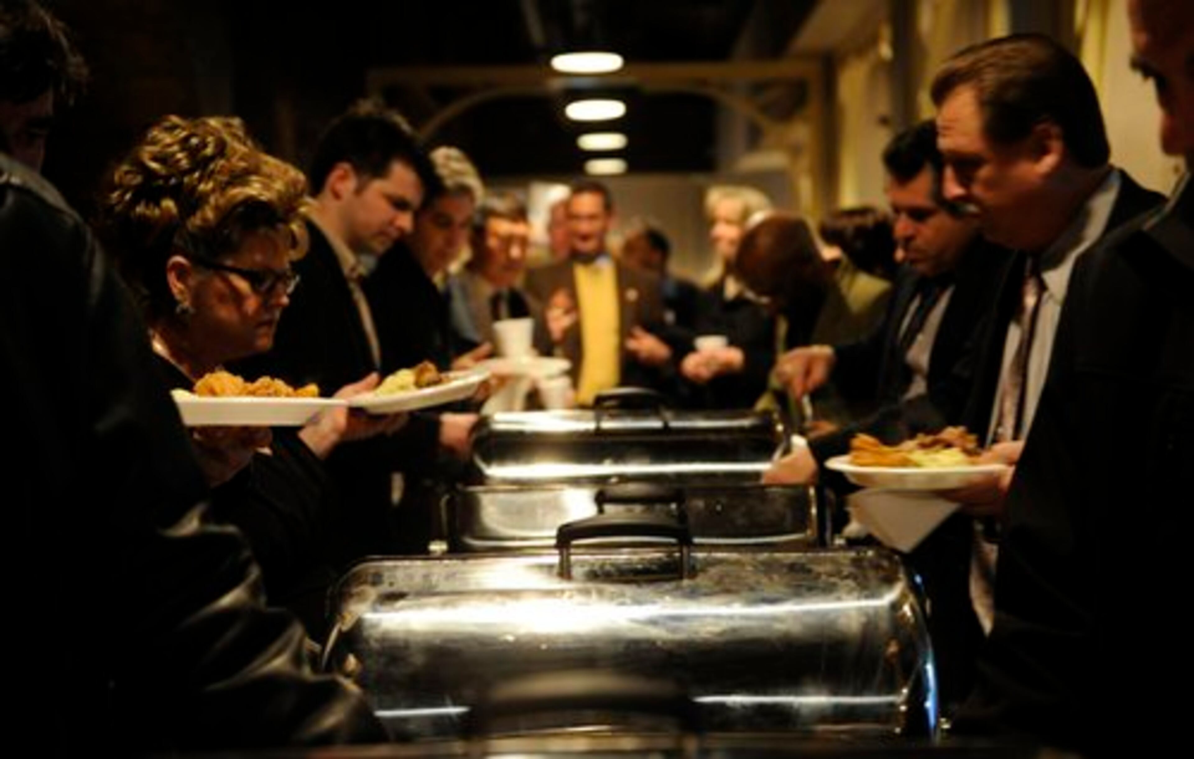 Georgia lawmakers, state employees and lobbyists prepared their plates for a night of feasting -- the 48th annual Wild Hog Supper at the historic railroad depot near the Gold Dome -- which traditionally kicks off the legislative session.