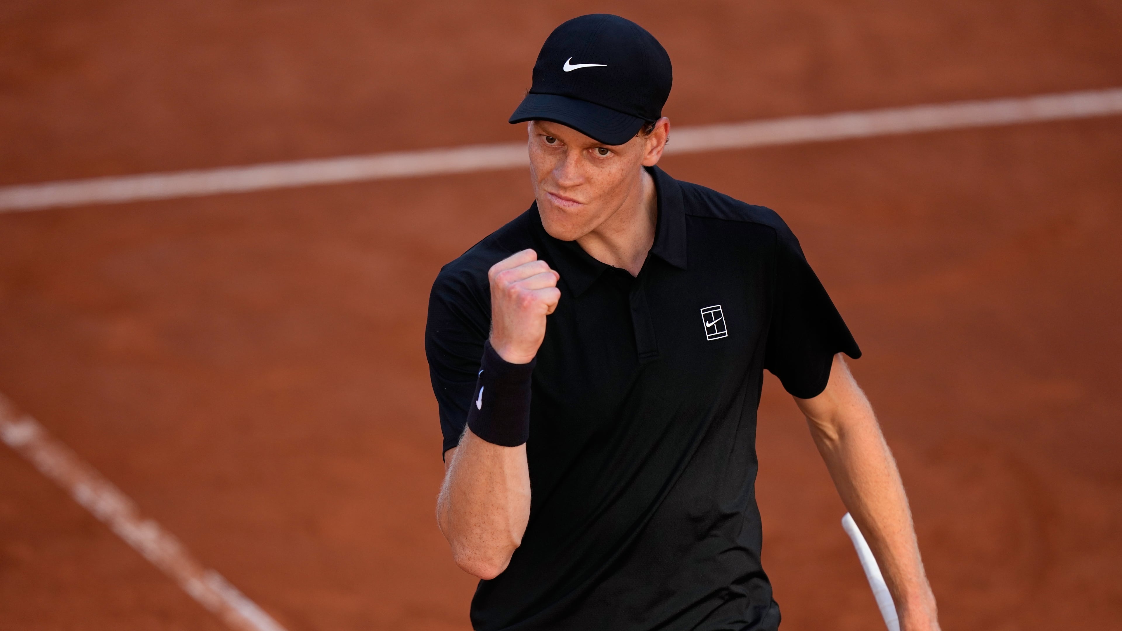 Jannik Sinner, of Italy, celebrates winning a point against Casper Ruud, of Norway, during the final match at the Italian Open tennis tournament, in Rome, Sunday, May 17, 2026. (AP Photo/Alessandra Tarantino)