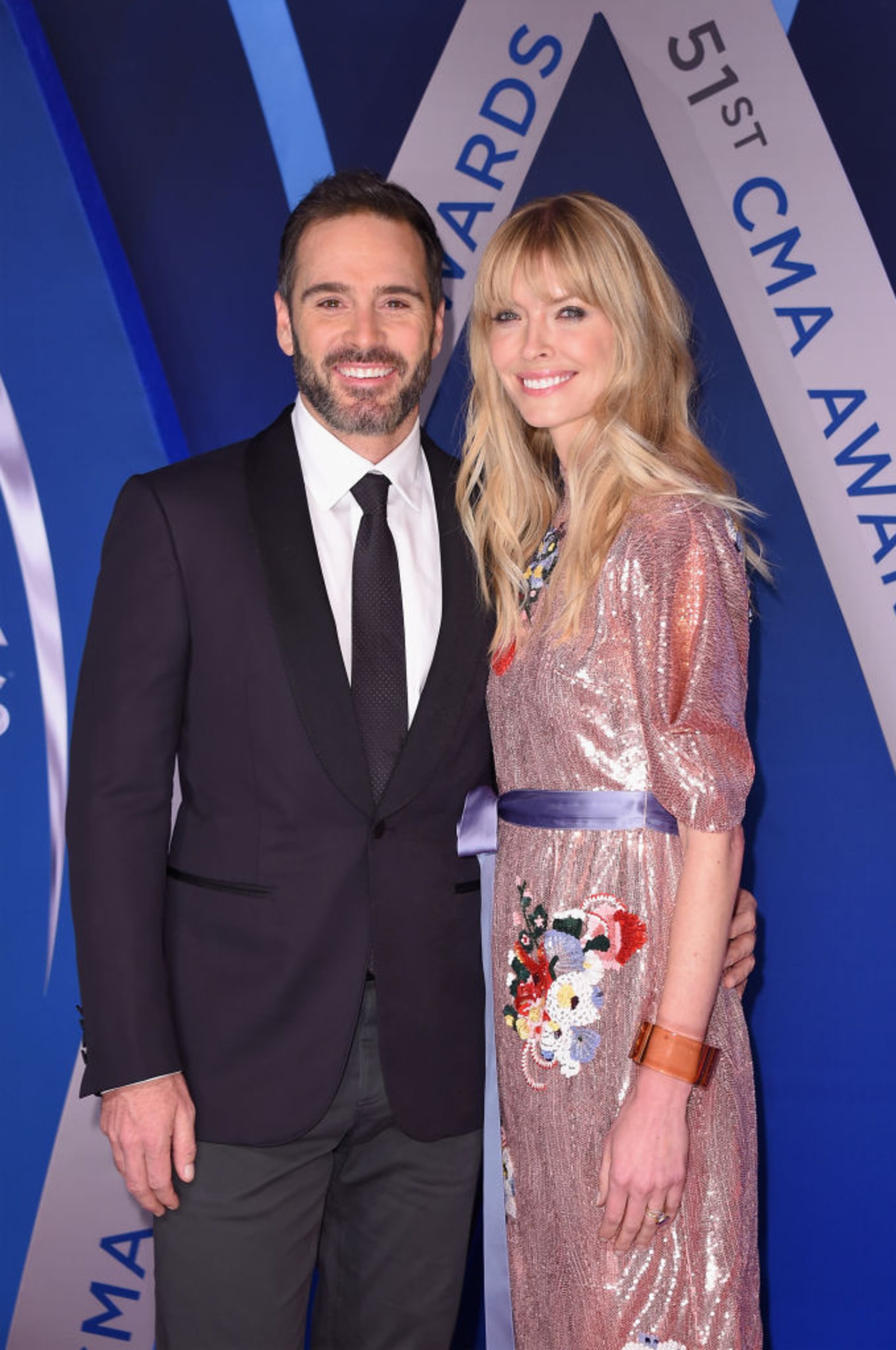NASHVILLE, TN - NOVEMBER 08: Nascar driver Jimmie Johnson and wife Chandra Janway Johnson attend the 51st annual CMA Awards at the Bridgestone Arena on November 8, 2017 in Nashville, Tennessee. (Photo by Michael Loccisano/Getty Images)