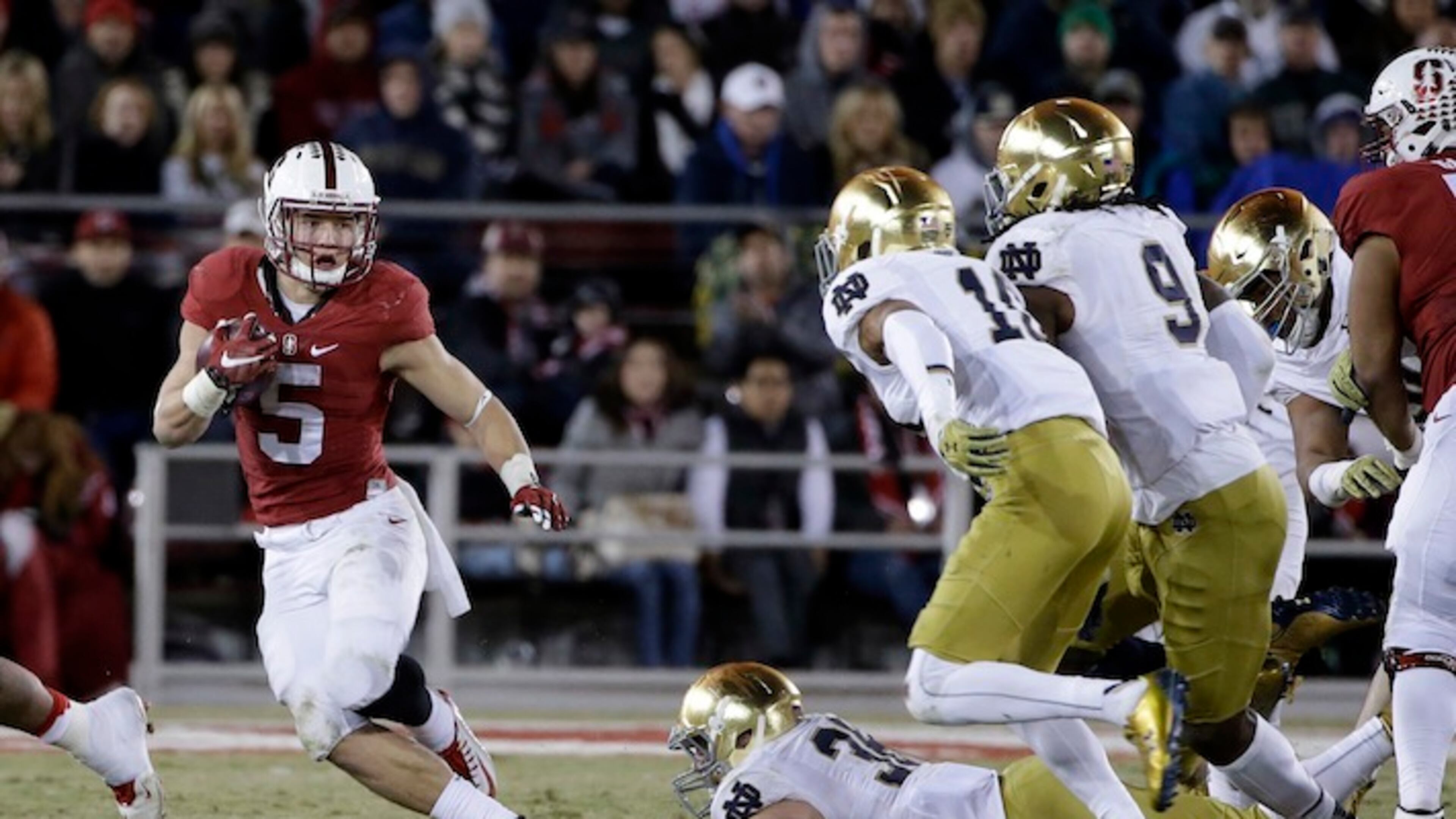 Stanford running back Christian McCaffrey (5) in action against Notre Dame during an NCAA college football game Saturday, Nov. 28, 2015, in Stanford, Calif. (AP Photo/Marcio Jose Sanchez)