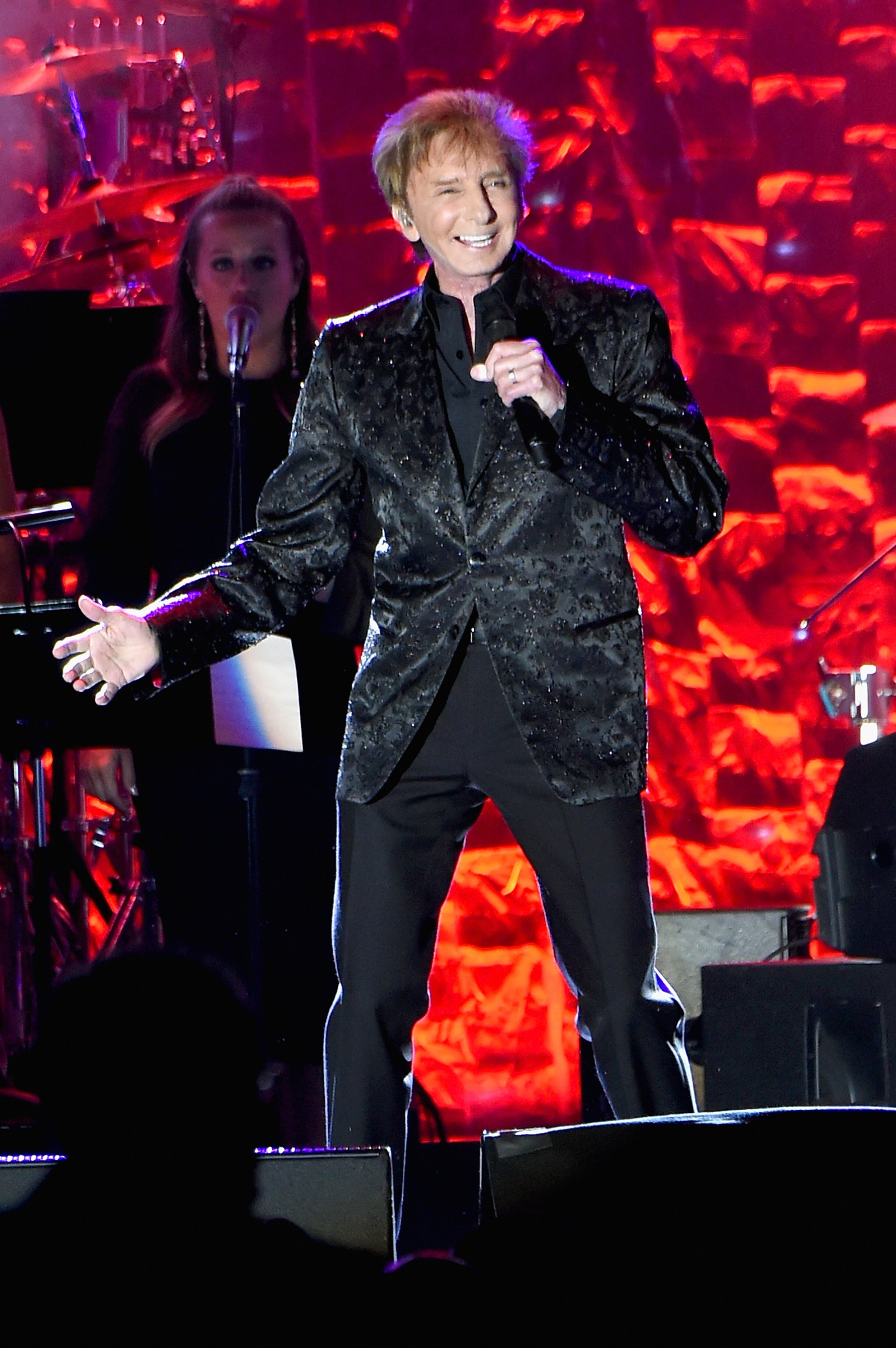 Barry Manilow opened the show. (Photo by Mike Coppola/Getty Images)