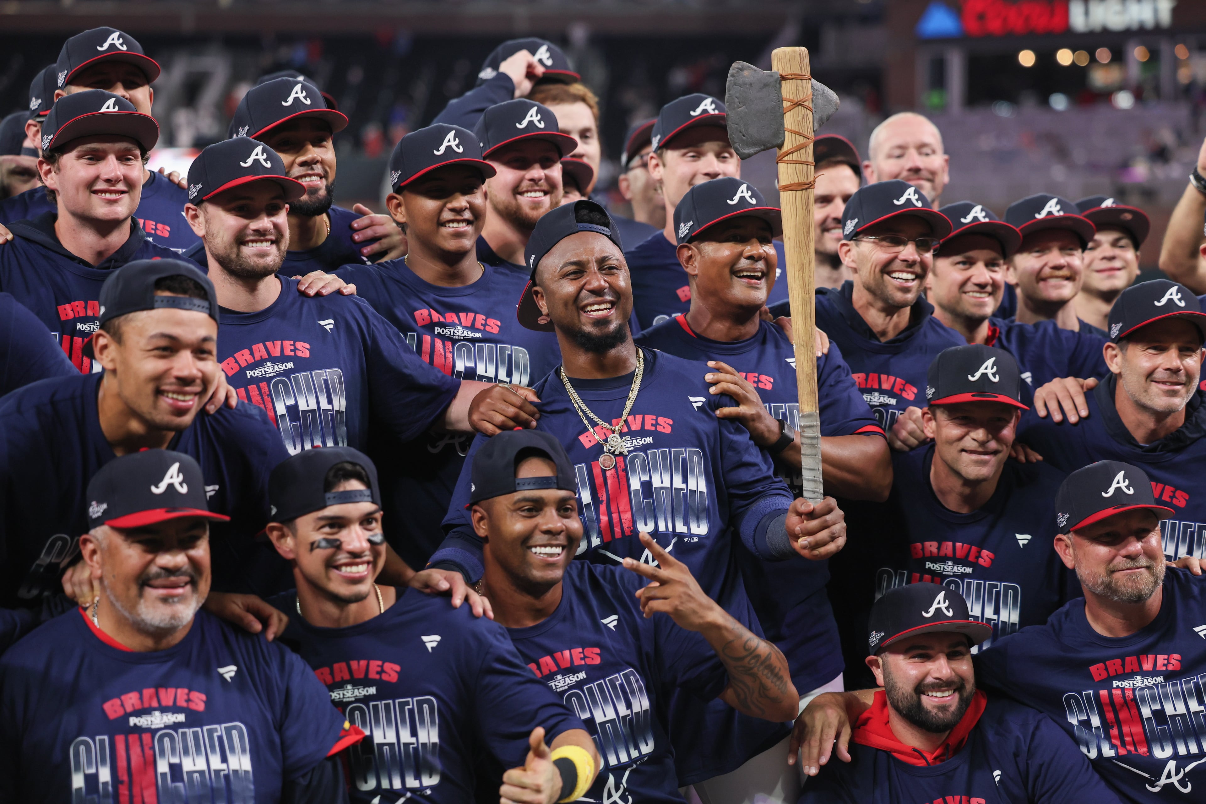 Braves players and coaches celebrate after defeating the Phillies during Game 3 to win their NL Wild Card Series on Thursday, Oct. 1, 2026, at Truist Park in Atlanta. (Jason Getz/AJC)