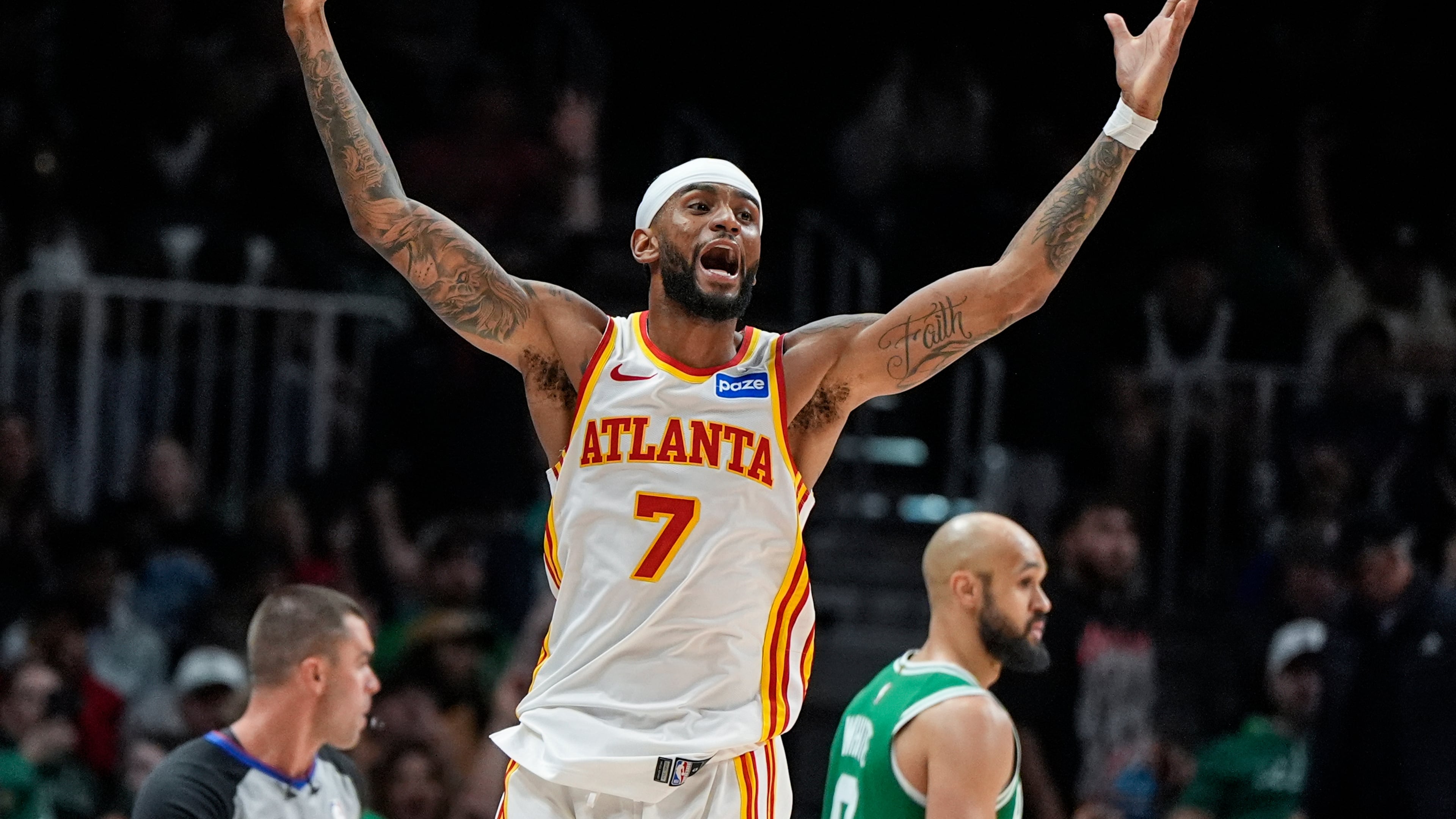 Atlanta Hawks guard Nickeil Alexander-Walker (7) celebrates his three-point shot against the Boston Celtics in the second half of an NBA basketball game, Monday, March 30, 2026, in Atlanta. (AP Photo/Mike Stewart)