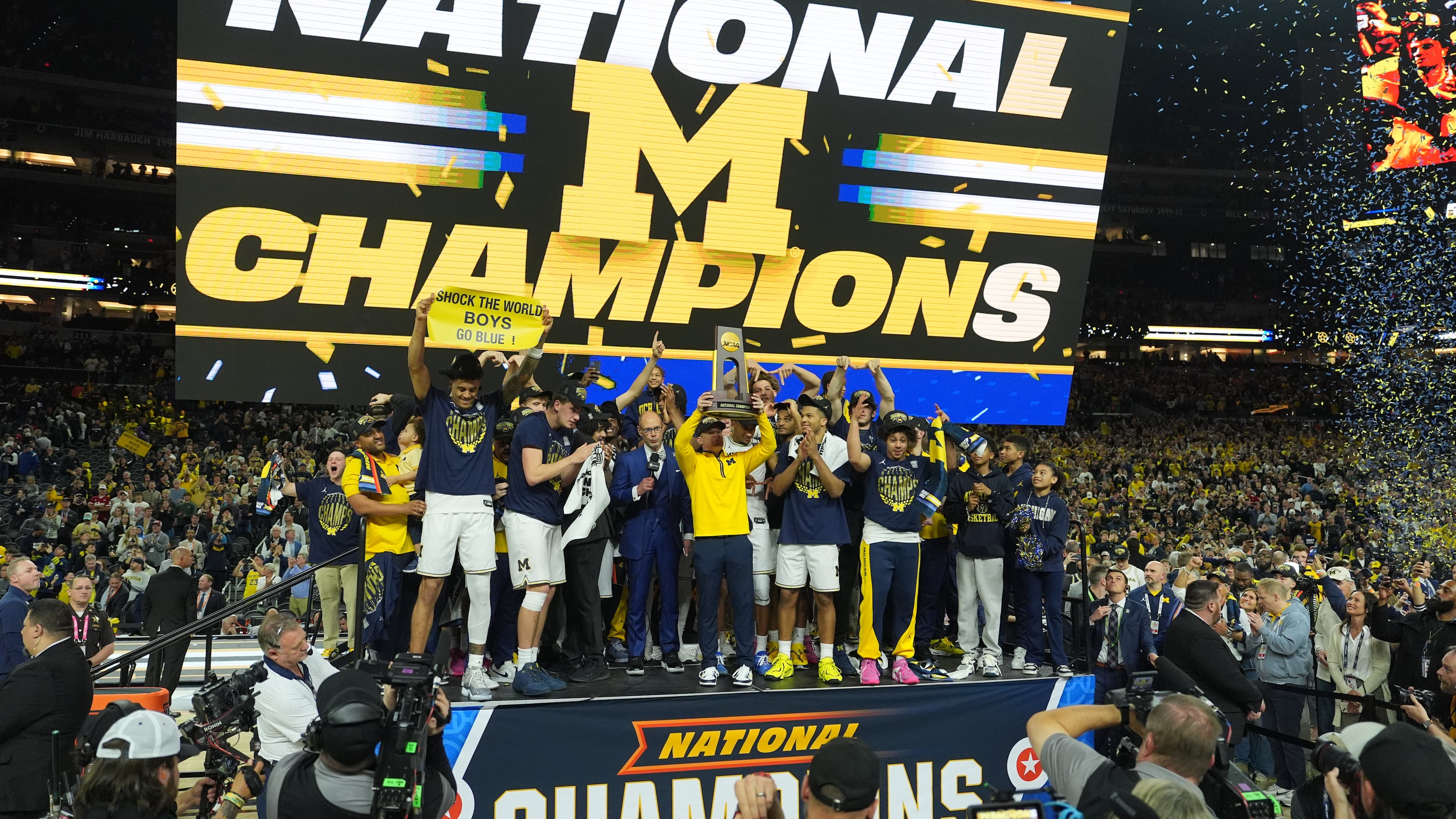 Michigan celebrates after defeating UConn in the NCAA college basketball tournament national championship game at the Final Four, Monday, April 6, 2026, in Indianapolis. (AP Photo/Michael Conroy)