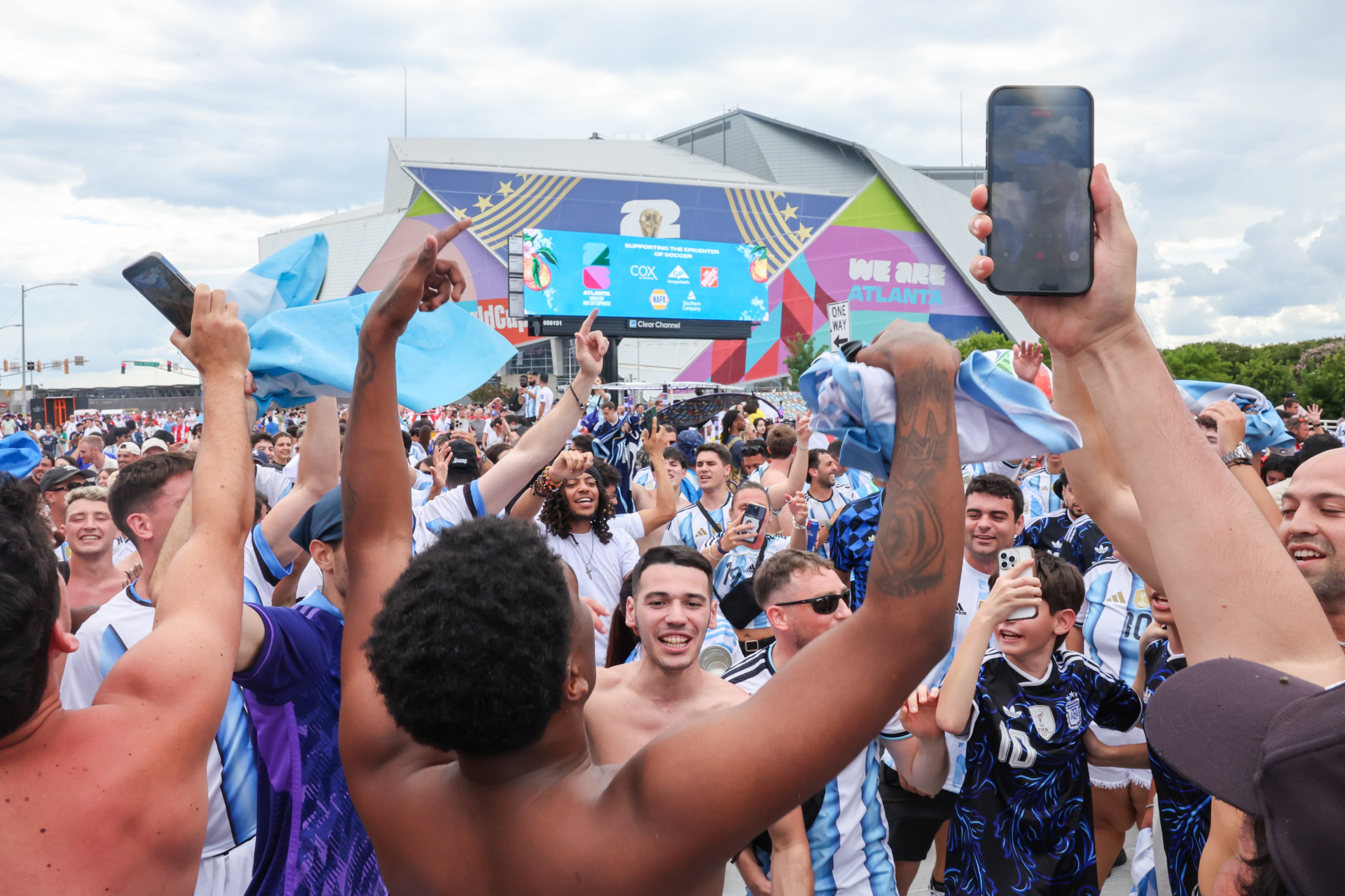 Argentina fans celebrate outside Atlanta Stadium (Mercedes-Benz Stadium) after Argentina wins the FIFA World Cup game between England and Argentina in Atlanta on July 15, 2026. It’s the last game Atlanta is hosting. Argentina won 2-1. (Arvin Temkar/AJC)