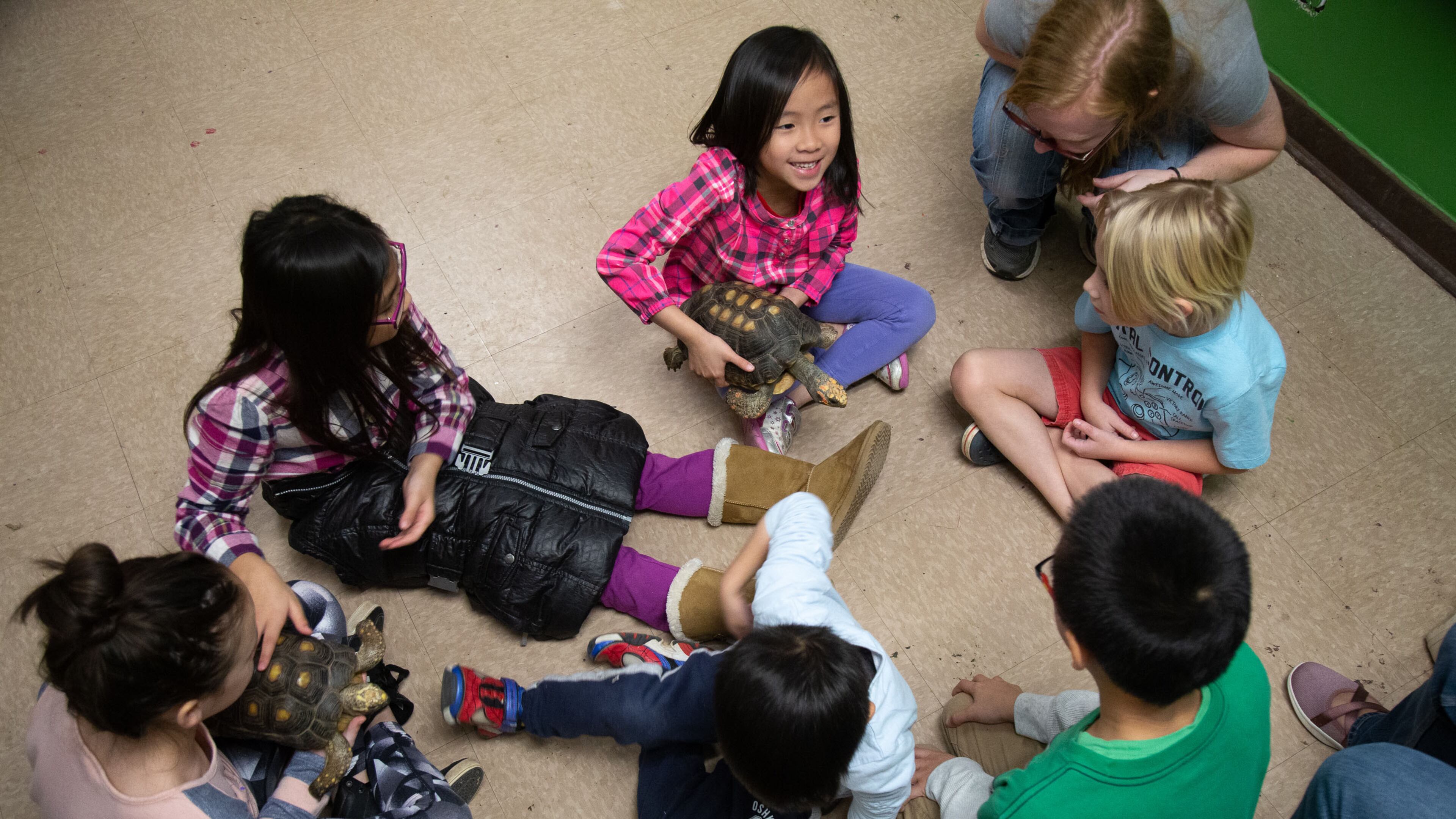 Kids pass around Tortoises at The Amphibian Foundation during the Atlanta Science Festival Saturday, March 9, 2019. STEVE SCHAEFER / SPECIAL TO THE AJC