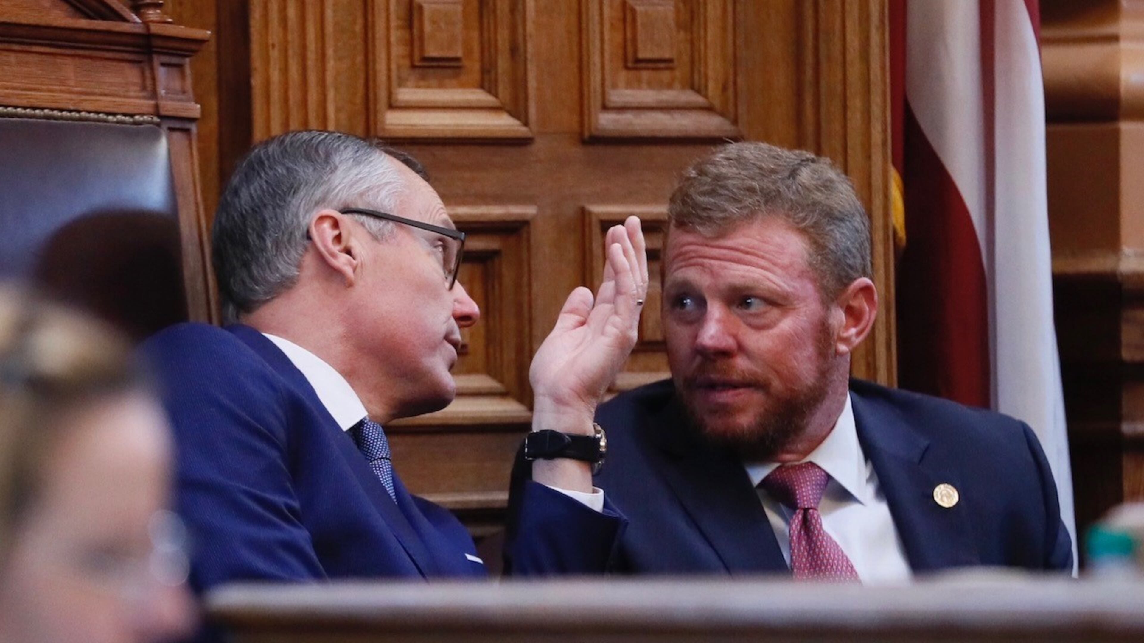 Lt. Gov. Casey Cagle speaks with Chris Riley, Gov. Nathan Deal's top aide, about the Delta tax break. Bob Andres/AJC