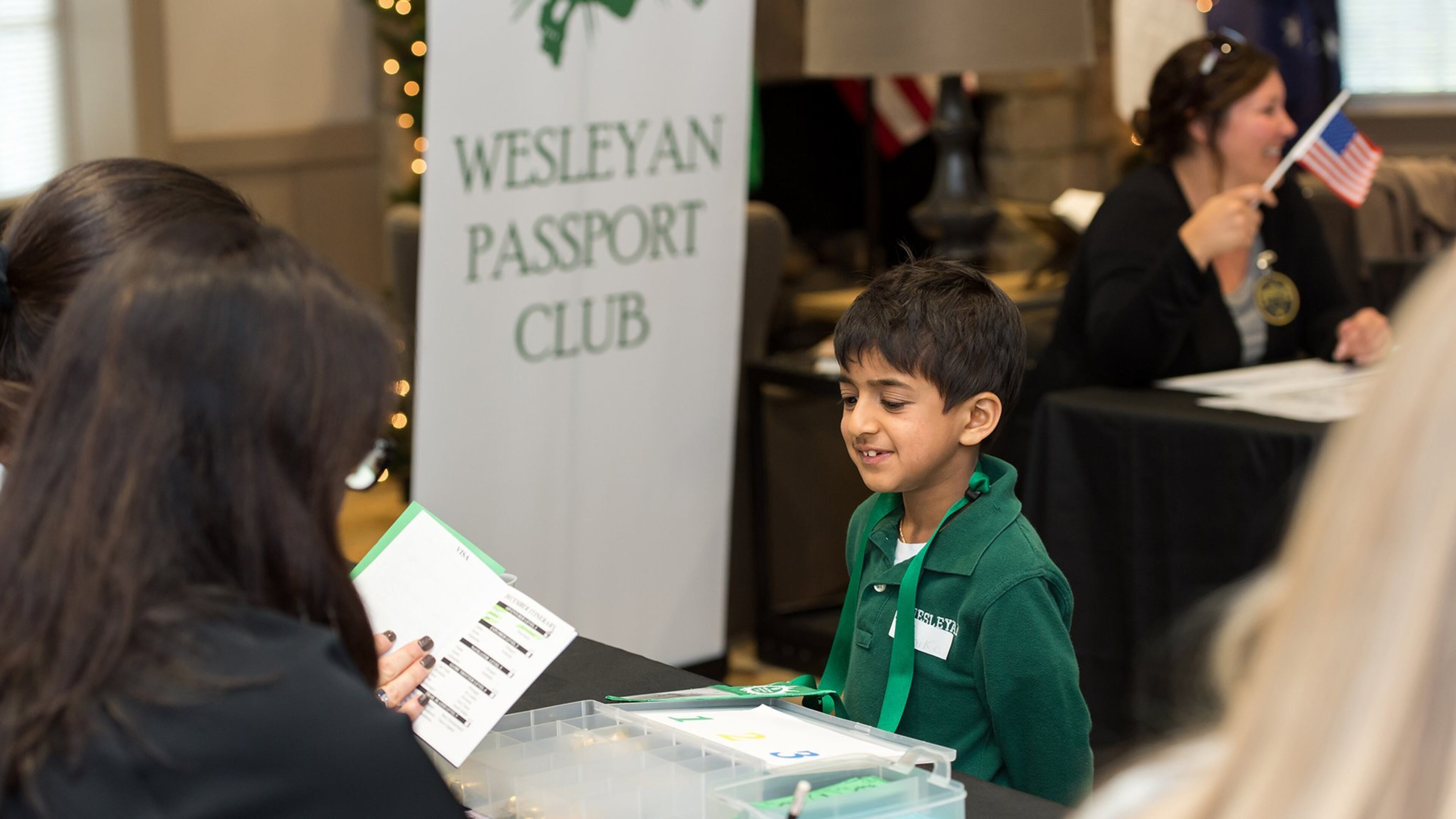 Wesleyan School student Sal Agarwal answers questions about countries he’s learned through the Passport Club, a program that promotes the study of countries around the globe. Students who master the material receive passport stamps and points they can redeem at a year-end bazaar. Photo courtesy of Wesleyan School.