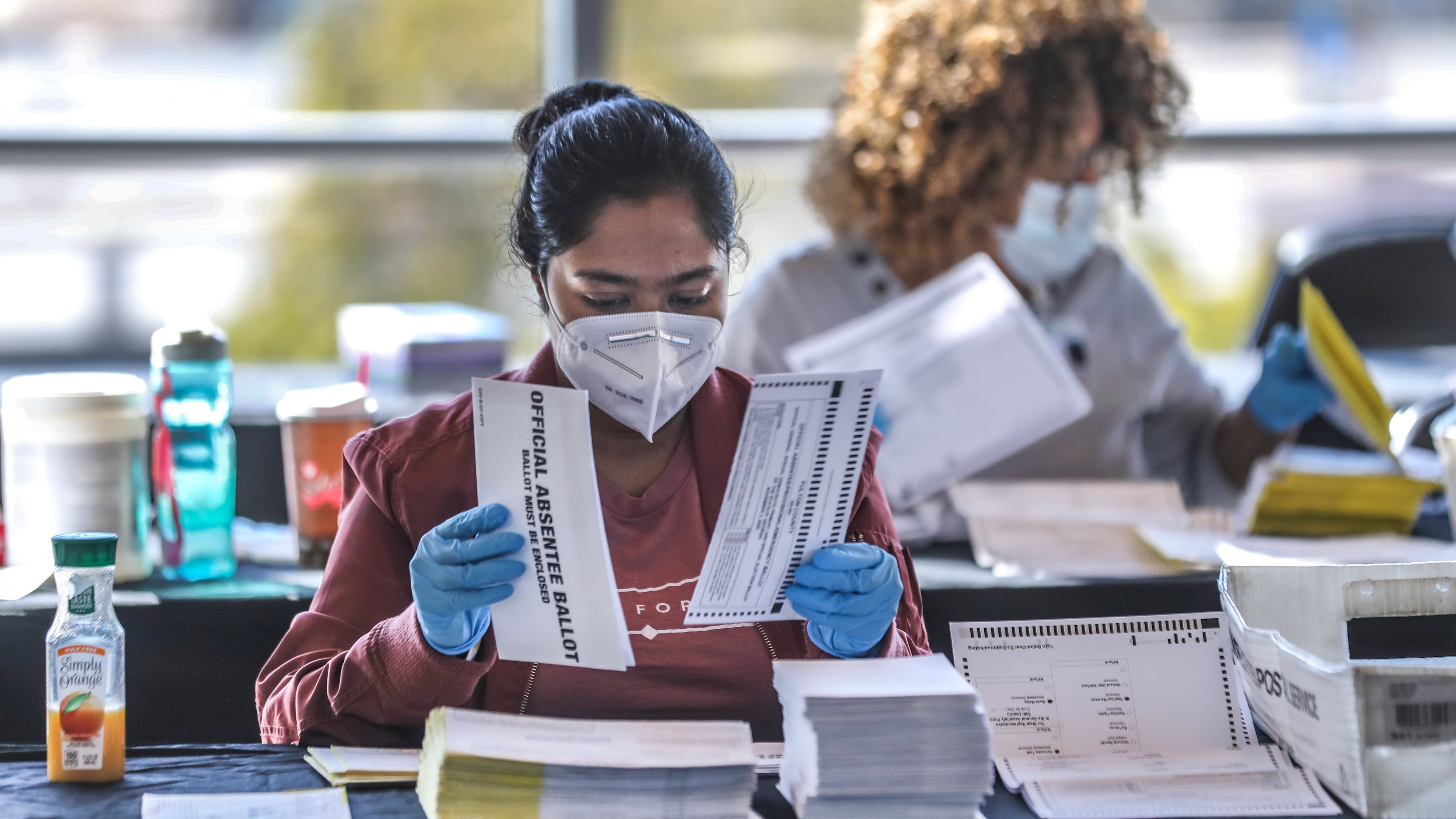 Fulton County election workers count and scan ballots on Wednesday, Nov. 4, 2020, as people across the state and nation eagerly waited to see the results of the general election in the county. (John Spink/AJC)