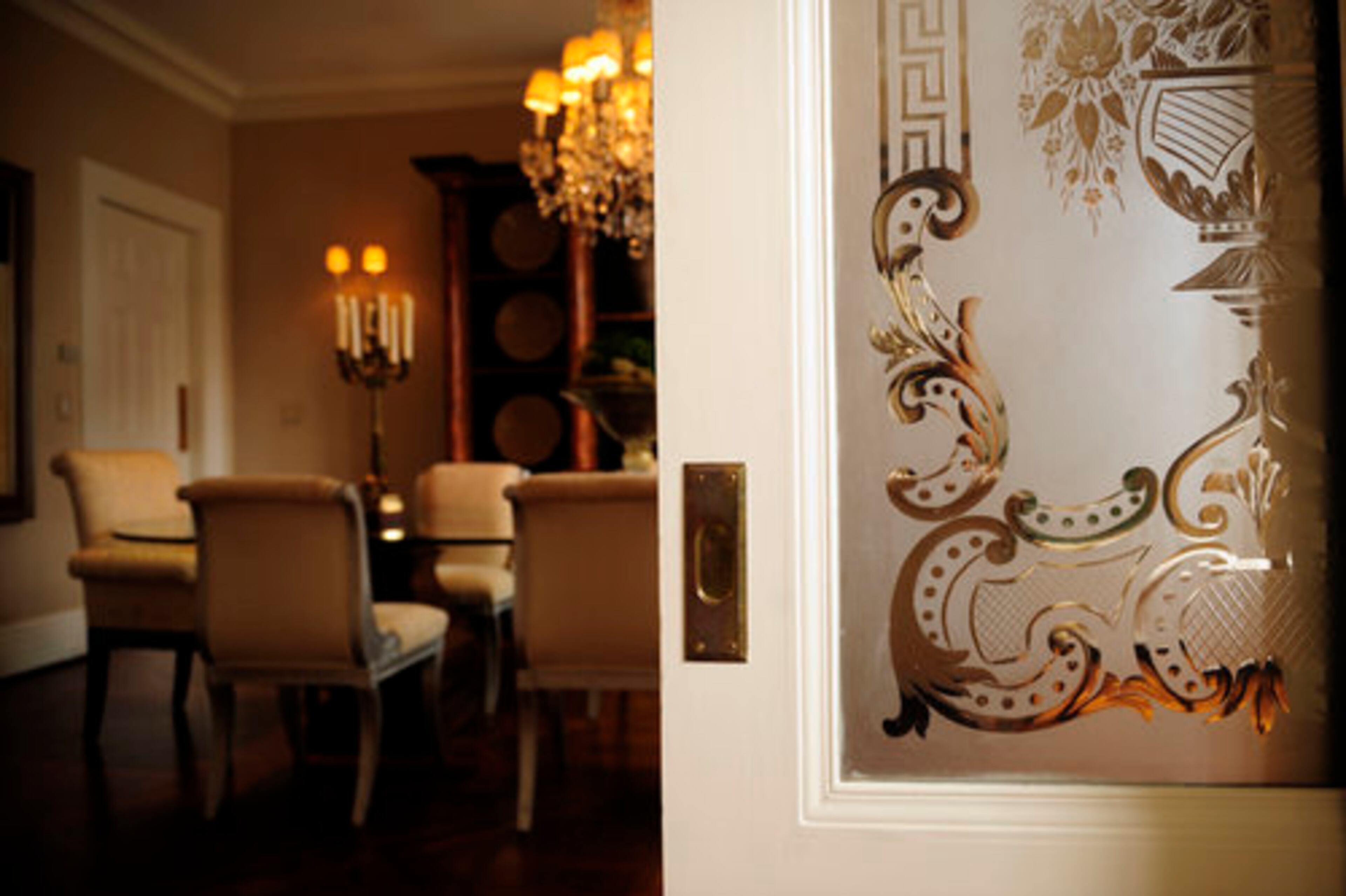 These sliding doors separating the living room from the dining room and came from the Austell home on Marietta Street. The Devines found a second pair in the attic that they think must have filled the archway from the living room to the library. Just part of the mystery of a nearly century-old home.