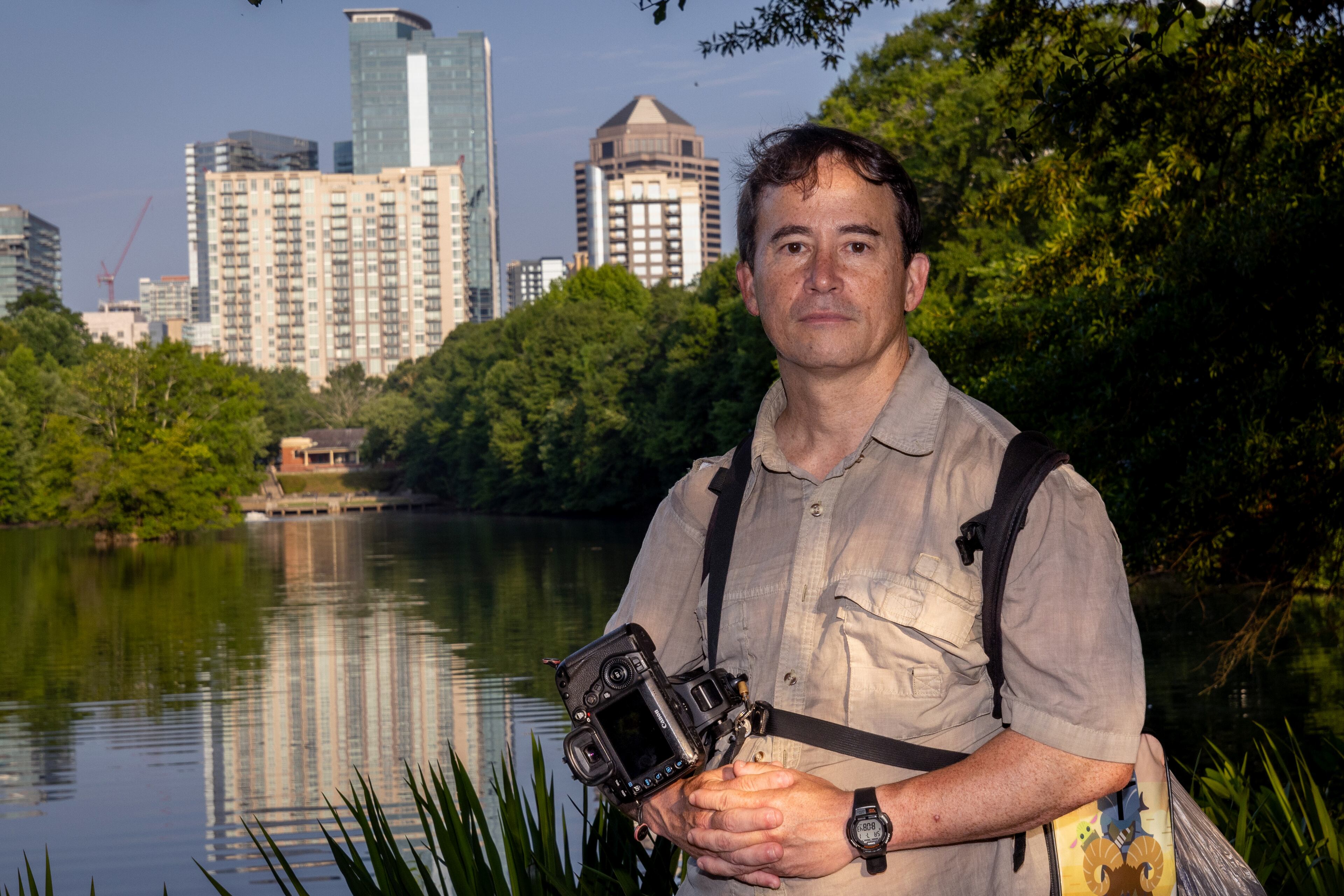 Photographer Kevin Gaston poses for a portrait at Piedmont Park in Atlanta on Saturday, July 1, 2023. (Steve Schaefer/steve.schaefer@ajc.com)