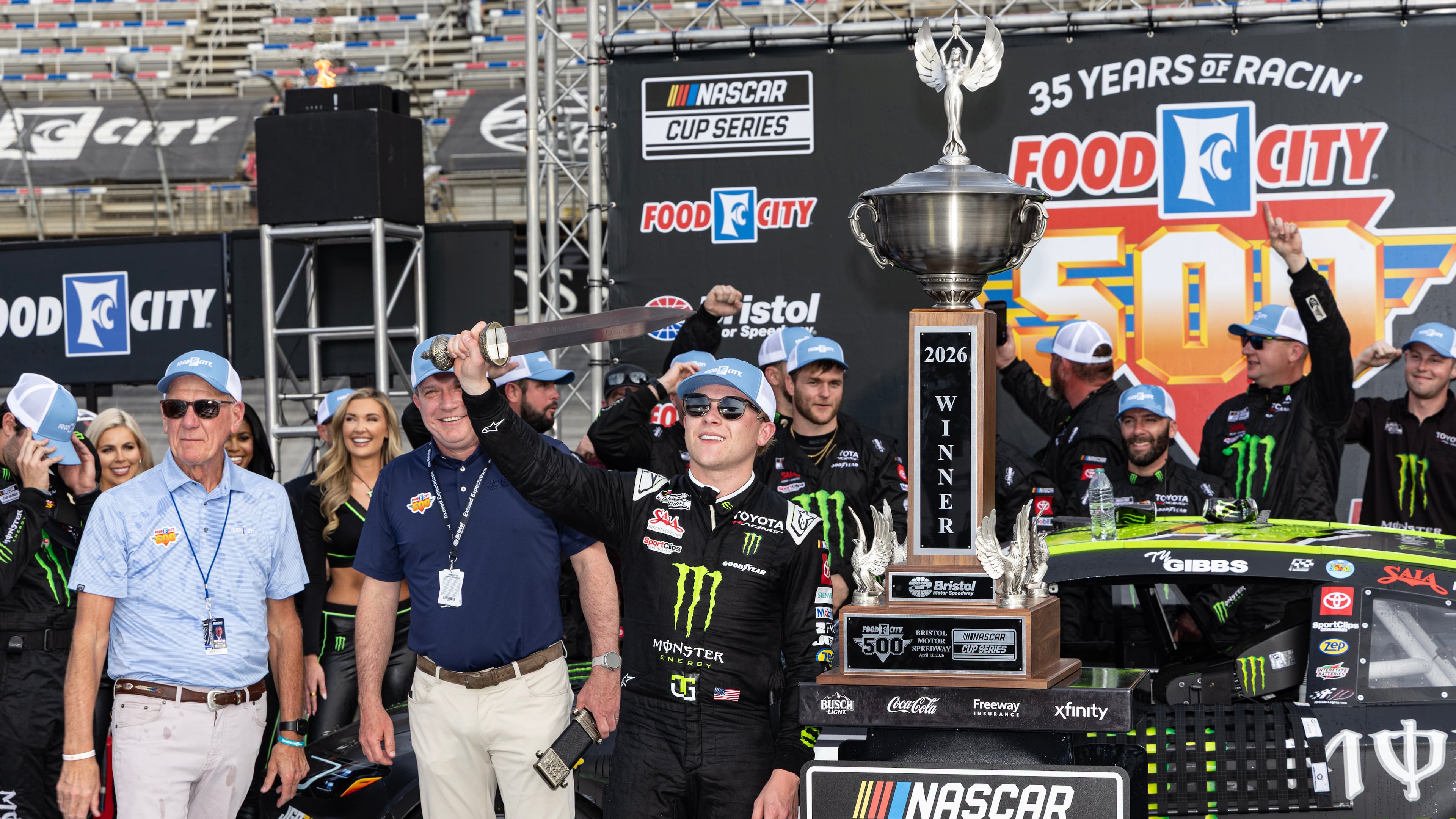 Ty Gibbs, center, celebrates after winning a NASCAR Cup Series auto race, Sunday, April 12, 2026, in Bristol, Tenn. (AP Photo/Wade Payne)