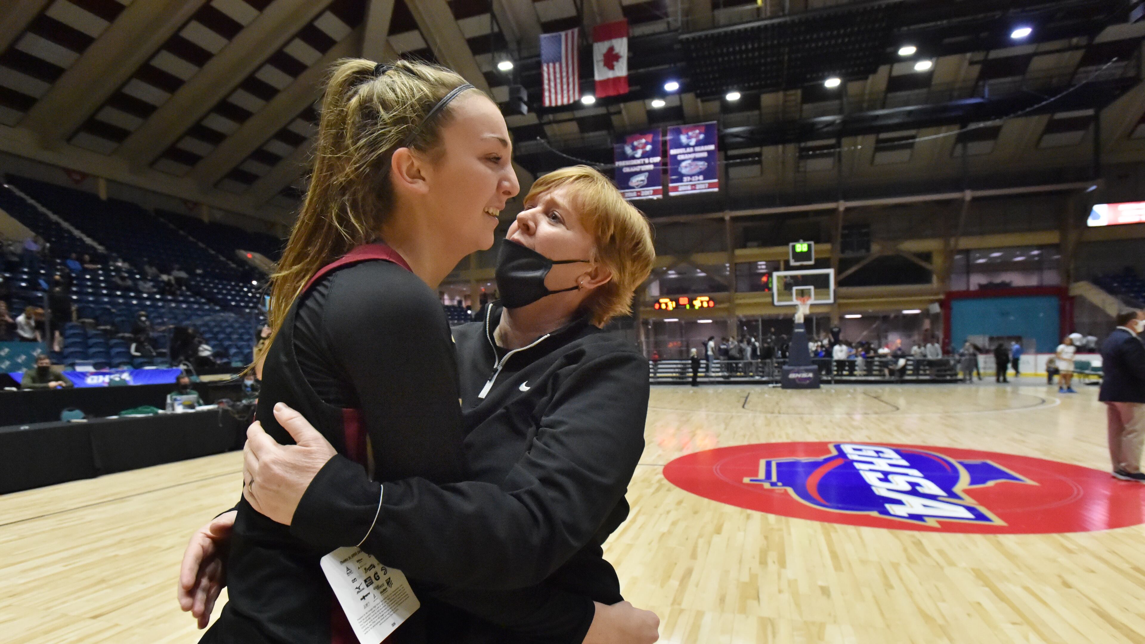 Hebron Christian's head coach Jan Azar (right) and Nicole Azar celebrate winning the Class A Private championship over St. Francis Wednesday, March 10, 2021, at the Macon Centreplex in Macon. Hebron Christian won 51-46 in overtime. (Hyosub Shin / Hyosub.Shin@ajc.com)