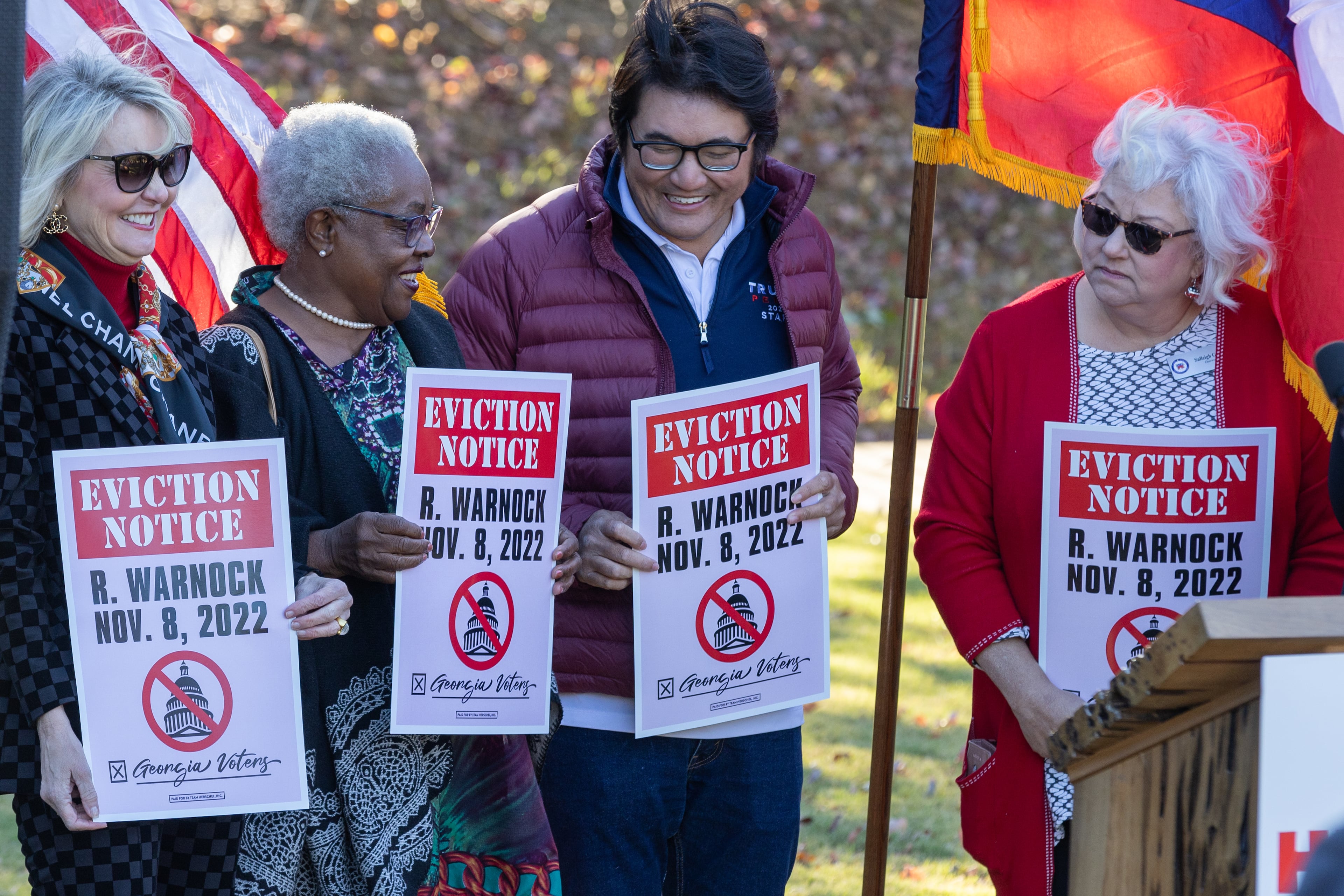Republican U.S. Senate candidate Herschel Walker said people who stood behind him during a press conference Tuesday near the Columbia Tower at MLK Village had been evicted. “Yes, it’s true," Walker said. "No one has left, but they got the eviction notice.”
But asked by The Atlanta Journal-Constitution if any of the people behind him holding eviction signs had been served with eviction notices, Walker declined to answer and none of the people behind him spoke to reporters. Steve Schaefer/steve.schaefer@ajc.com)