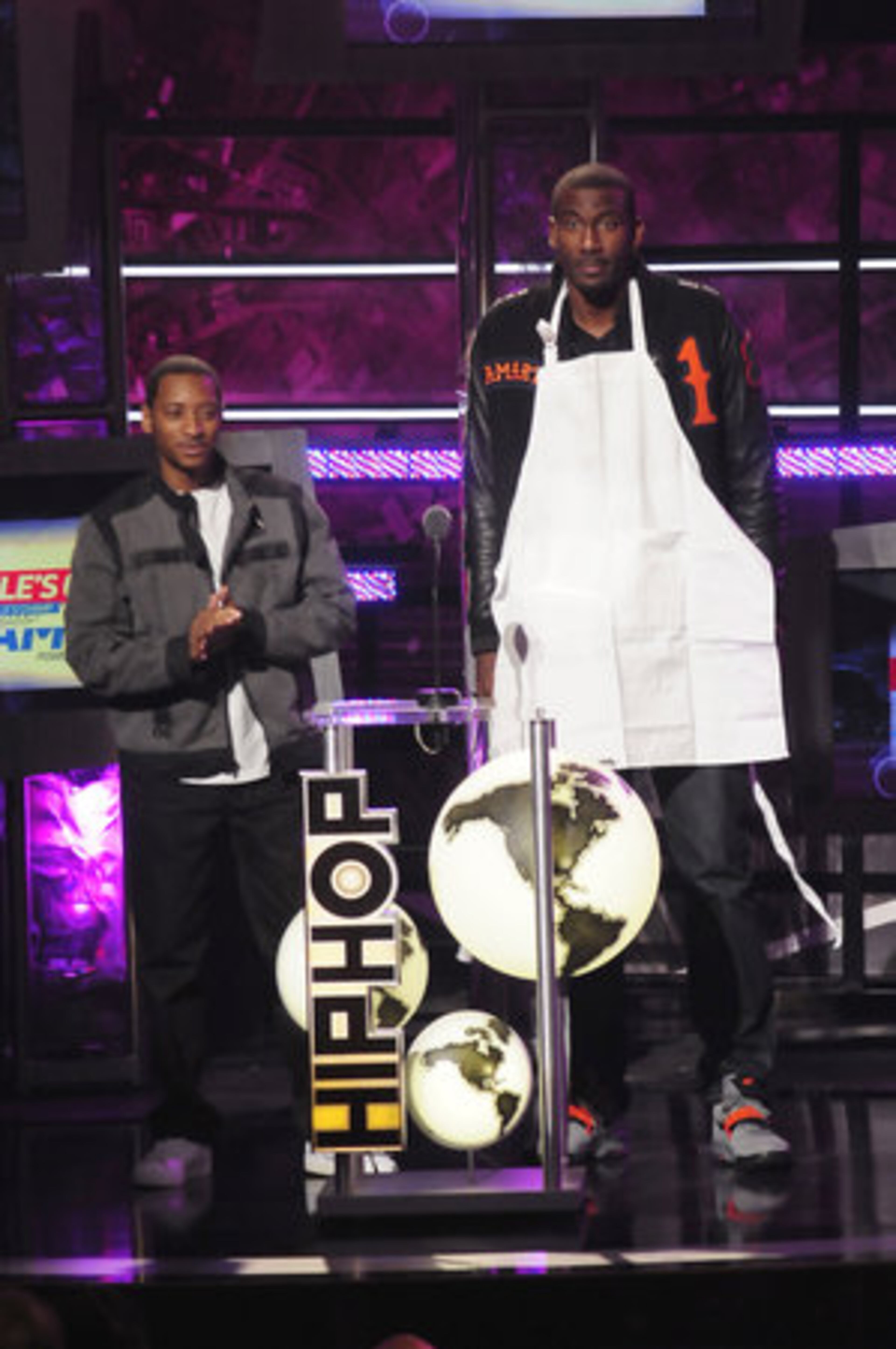 Barry Floyd and New York Knick Amar'e Stoudemire present the winner of the People's Champ award.