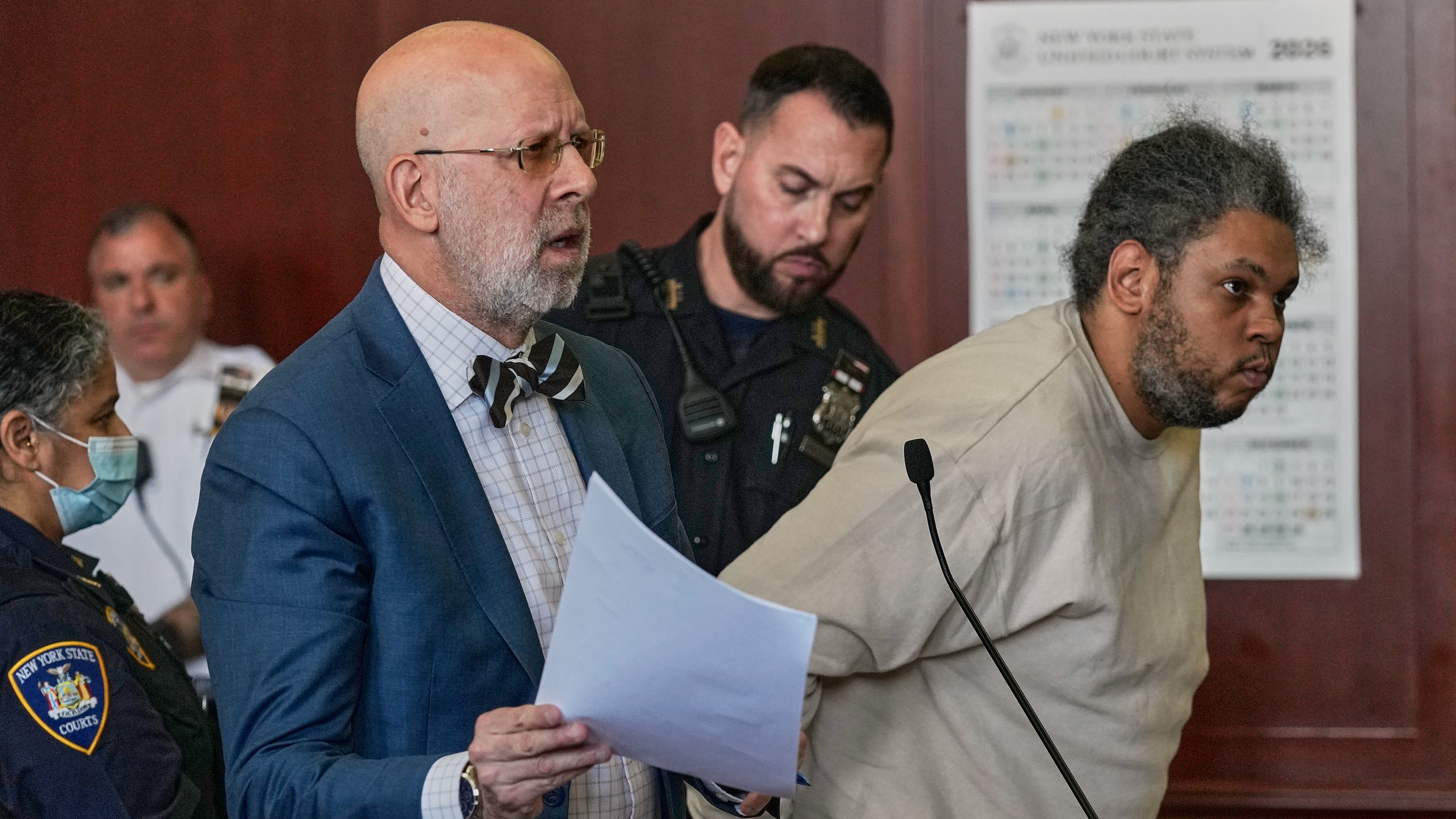 Randy Santos, right, and his attorney Arnold Levine appear in court after he was sentenced for fatally beating four sleeping men on the streets in 2019, in New York, Thursday, May 28, 2026. (AP Photo/Richard Drew)