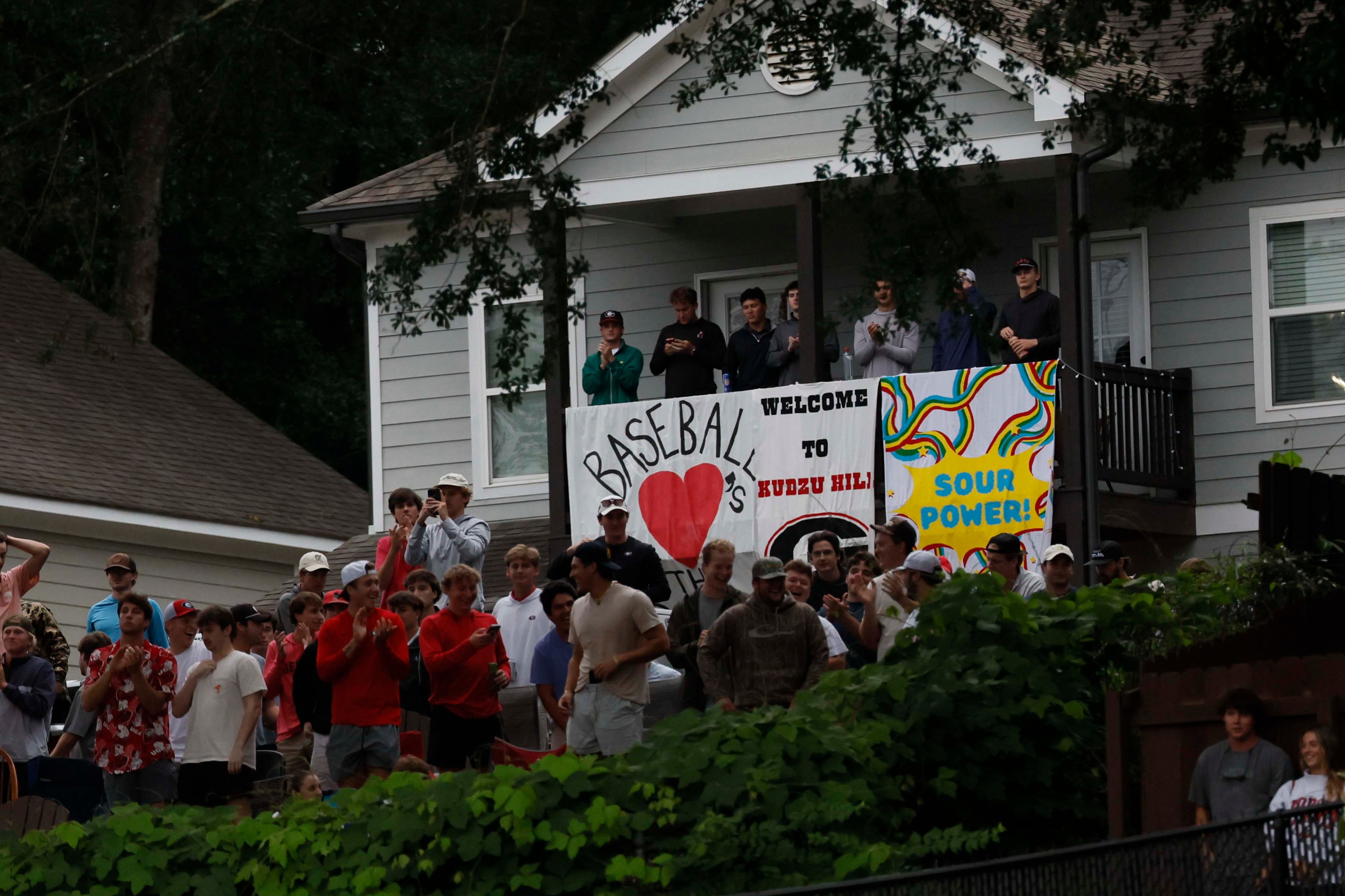 UGA fans cheer at Kudzu Hill after a home run by Georgia Bulldogs infielder Michael O’Shaughnessy (4) during the eighth inning of their NCAA Regional final game at Foley Field on Sunday, May 31, 2026, in Athens..(Miguel Martinez/AJC)