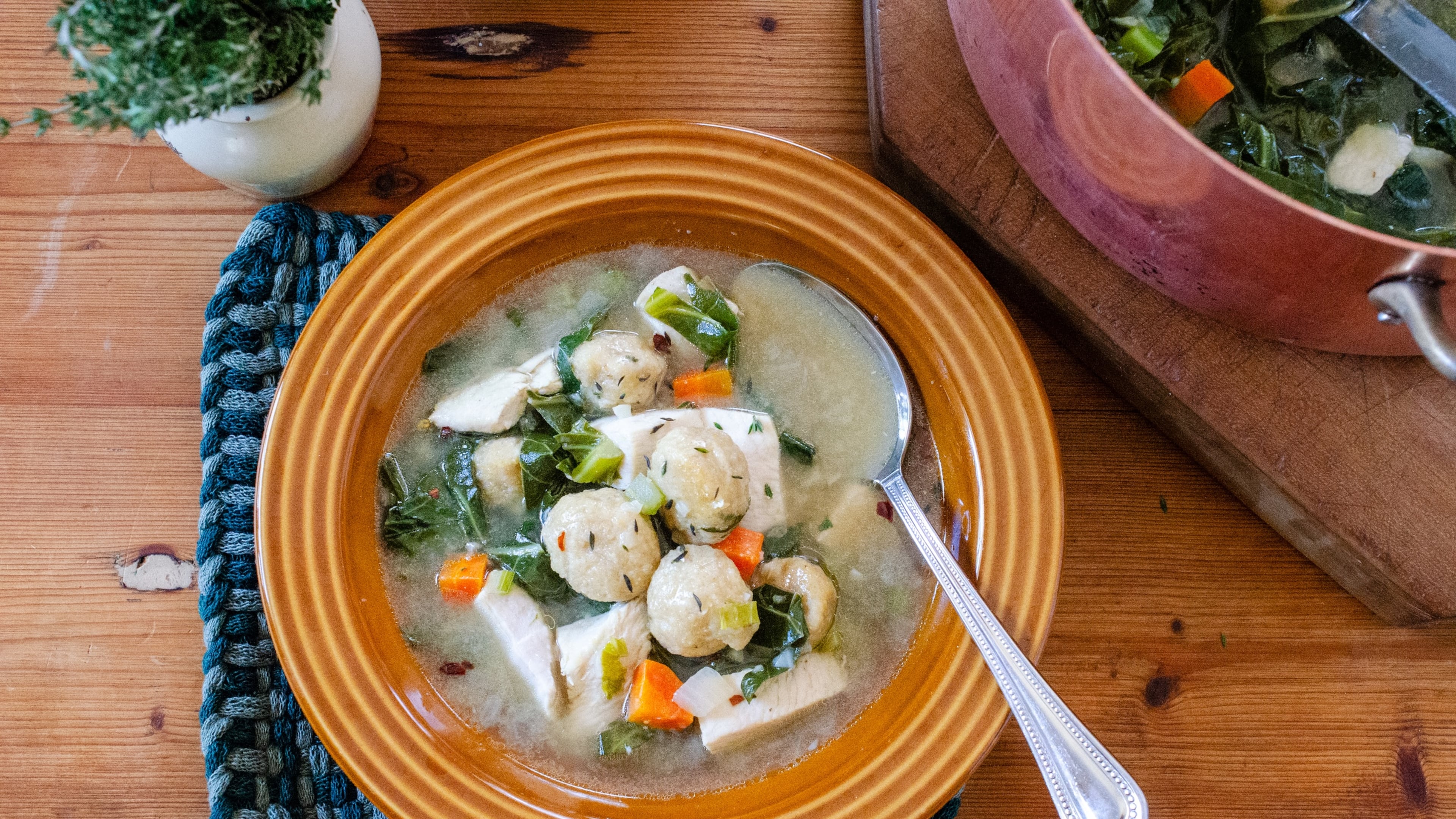 Enjoy more vegetables and whole grains in this nutritous version of chicken and dumplings. (Virginia Willis for the AJC)