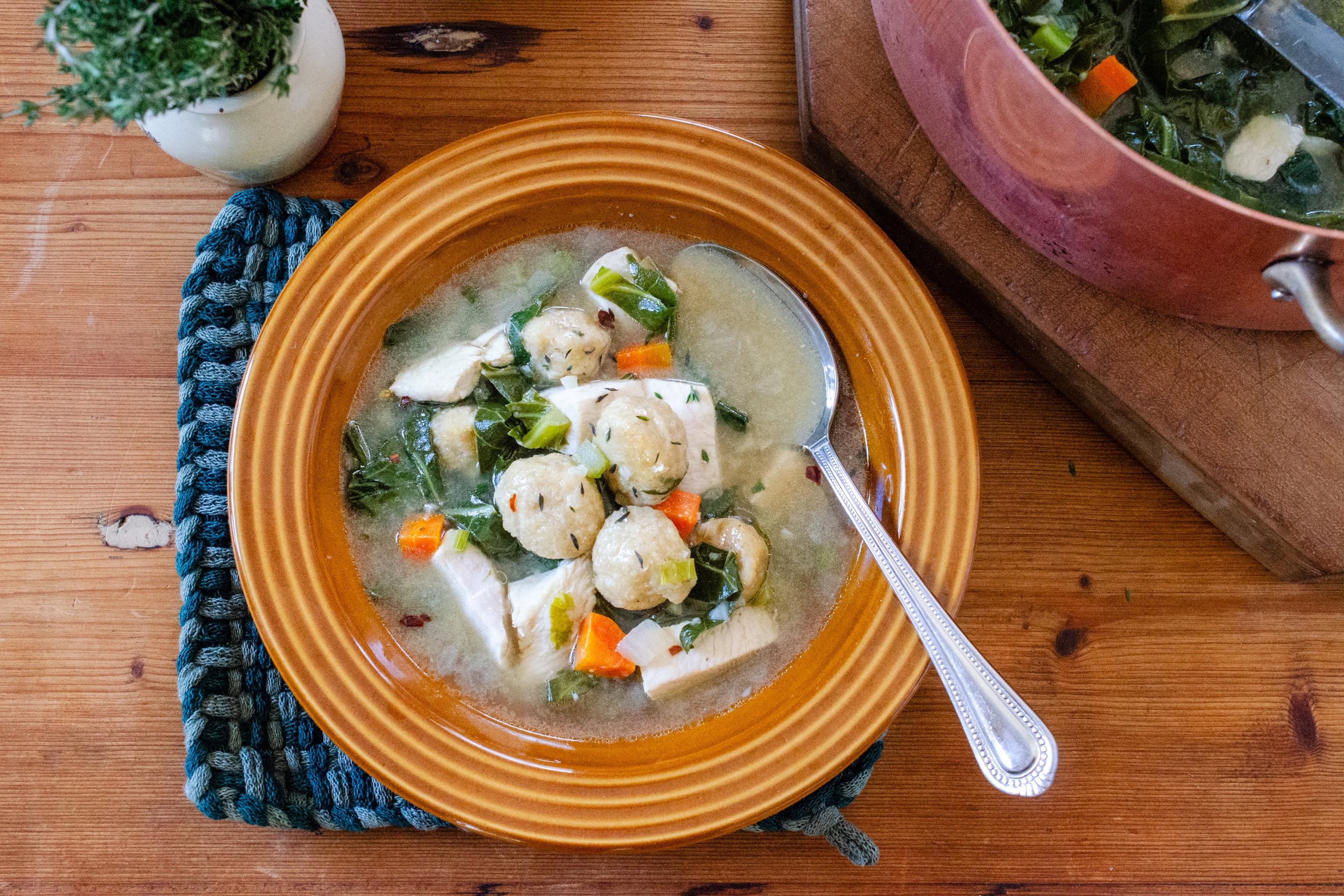 Enjoy more vegetables and whole grains in this nutritous version of chicken and dumplings. (Virginia Willis for the AJC)