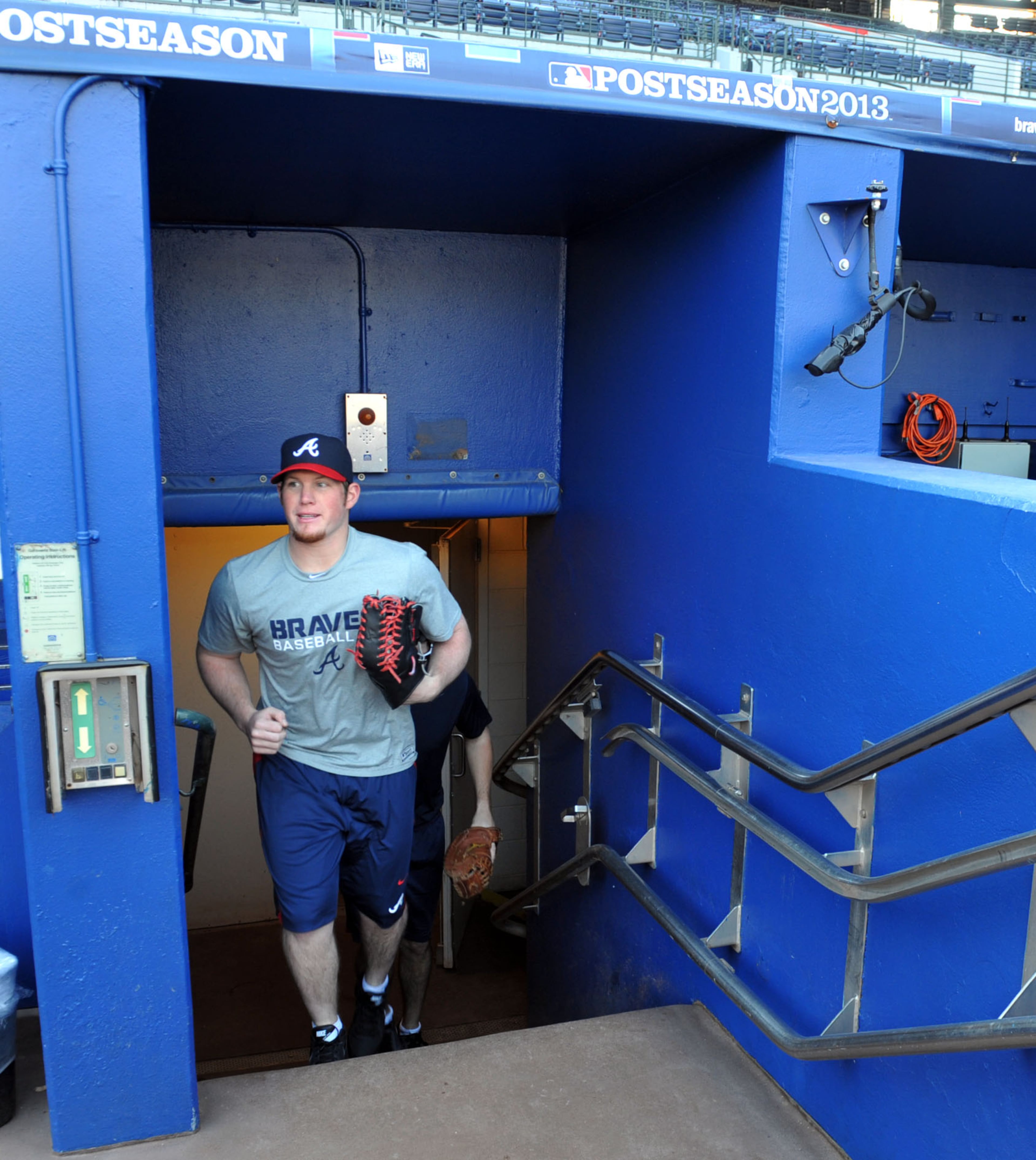 2014: Atlanta Braves closer Craig Kimbrel heads to the field as he works out at Turner field on the first day of pitching camp, Monday, January 27, 2014. KENT D JOHNSON/KDJOHNSON@AJC.COM