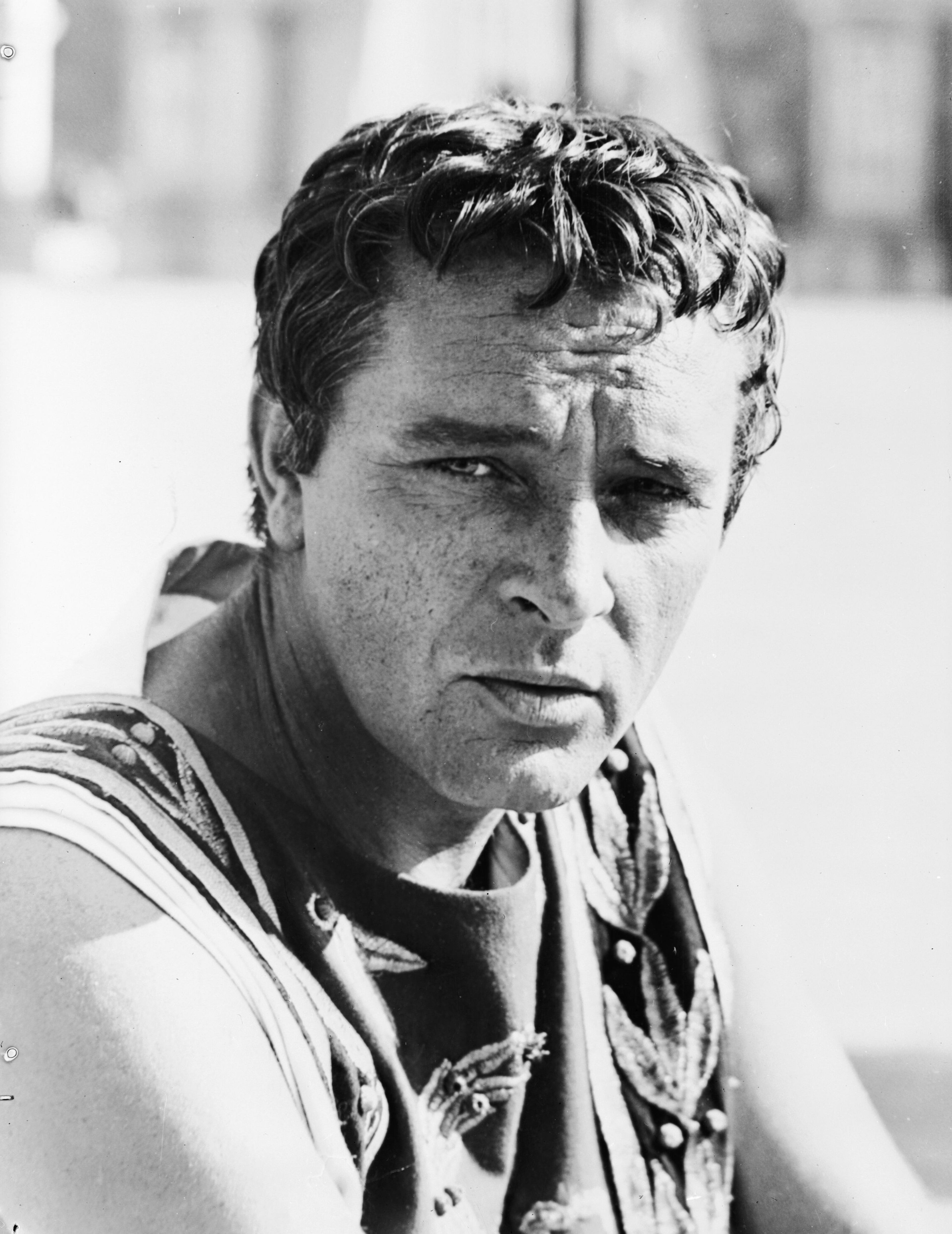 Richard Burton was born into a family of 13 to a coal miner father. He was unofficially adopted by his schoolmaster whose last name he adopted. (Photo by Keystone/Getty Images)
