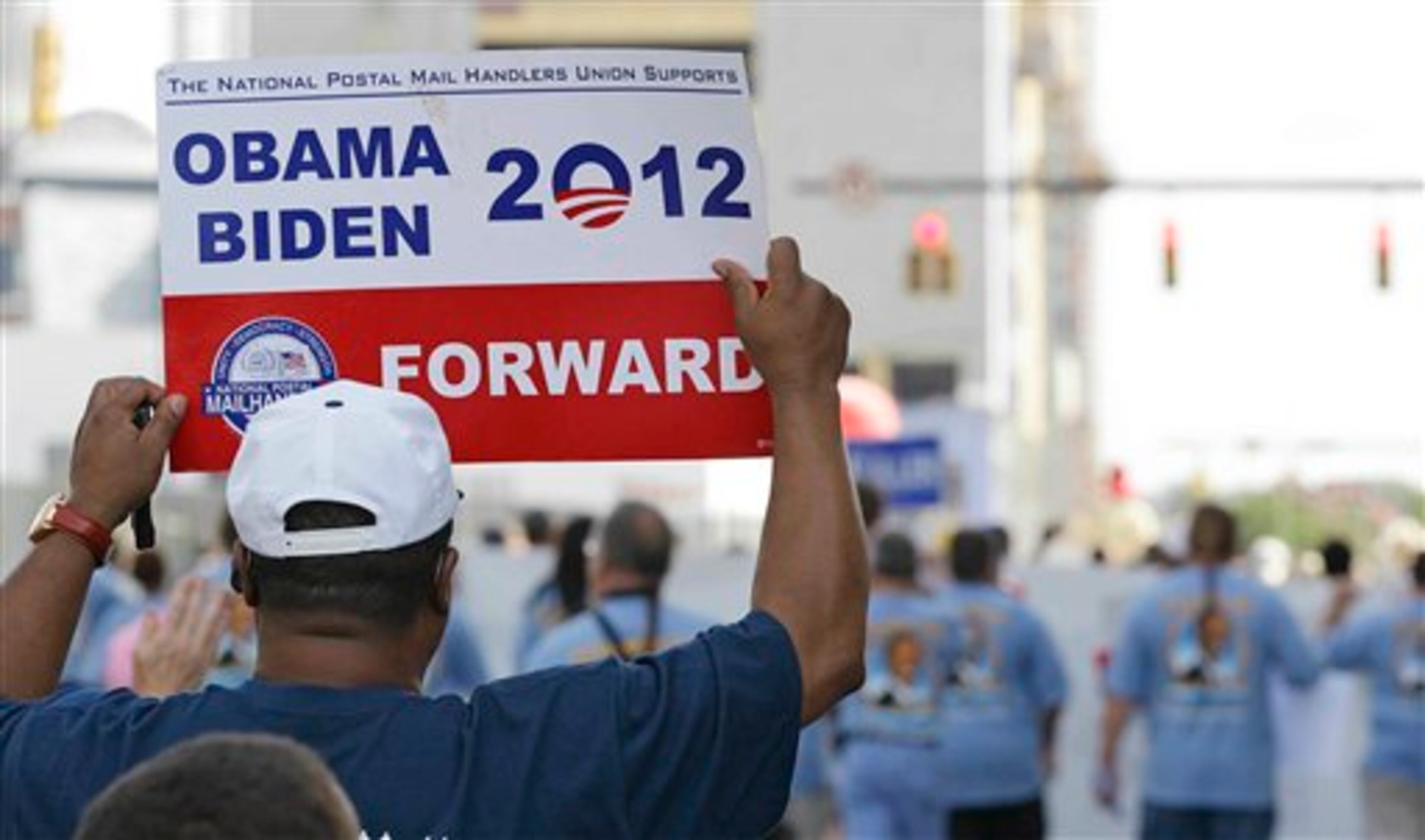 Demonstrators march in a Labor Day parade, Monday, Sept. 3, 2012, in Charlotte, N.C. Demonstrators are protesting before the start of the Democratic National Convention. (AP Photo/Chuck Burton)