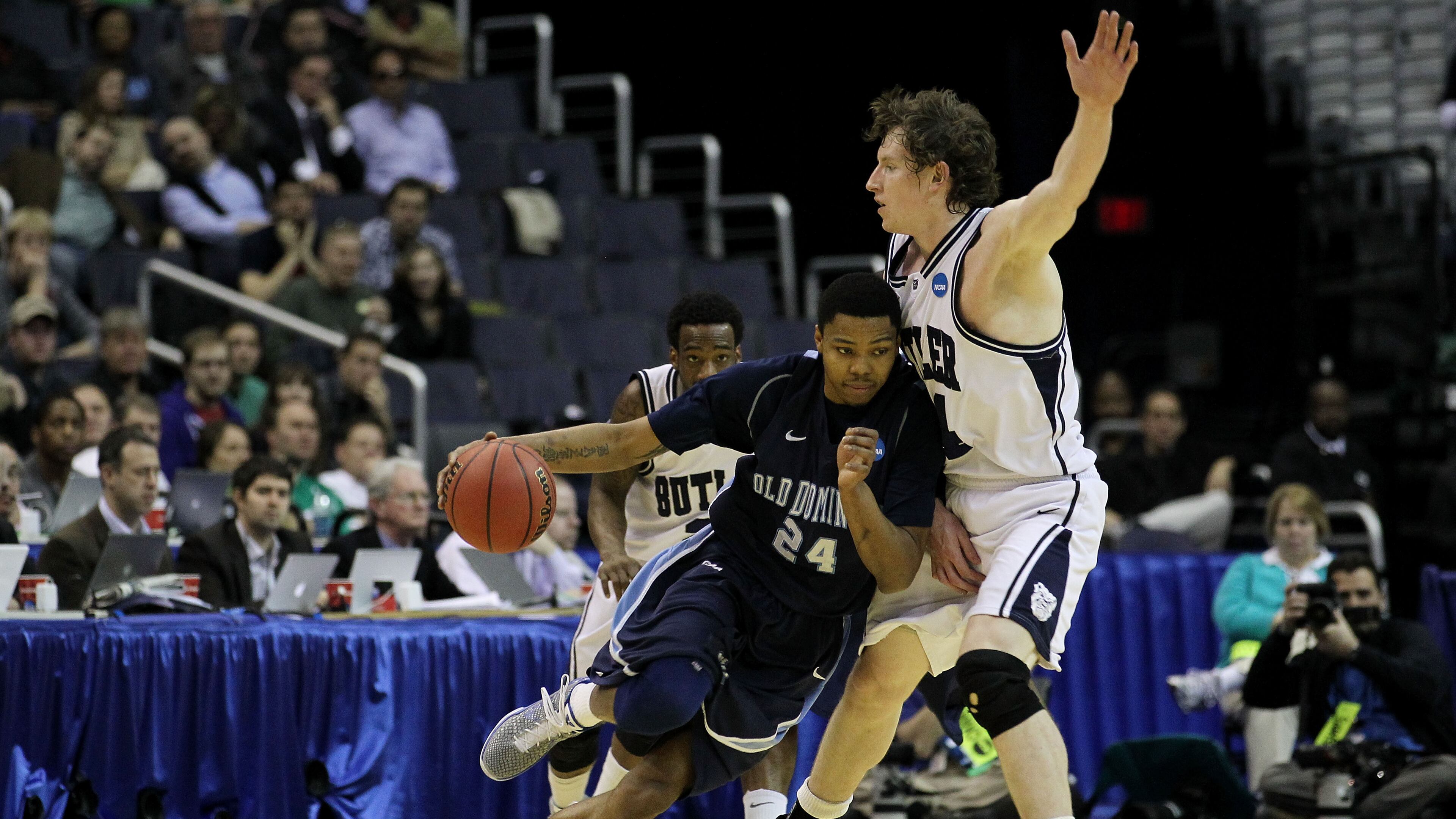Kent Bazemore of the Old Dominion Monarchs tries to drive past Andrew Smith of the Butler Bulldogs during the second round of the 2011 NCAA men’s basketball tournament at the Verizon Center on March 17, 2011 in Washington, DC. (Photo by Nick Laham/Getty Images)
