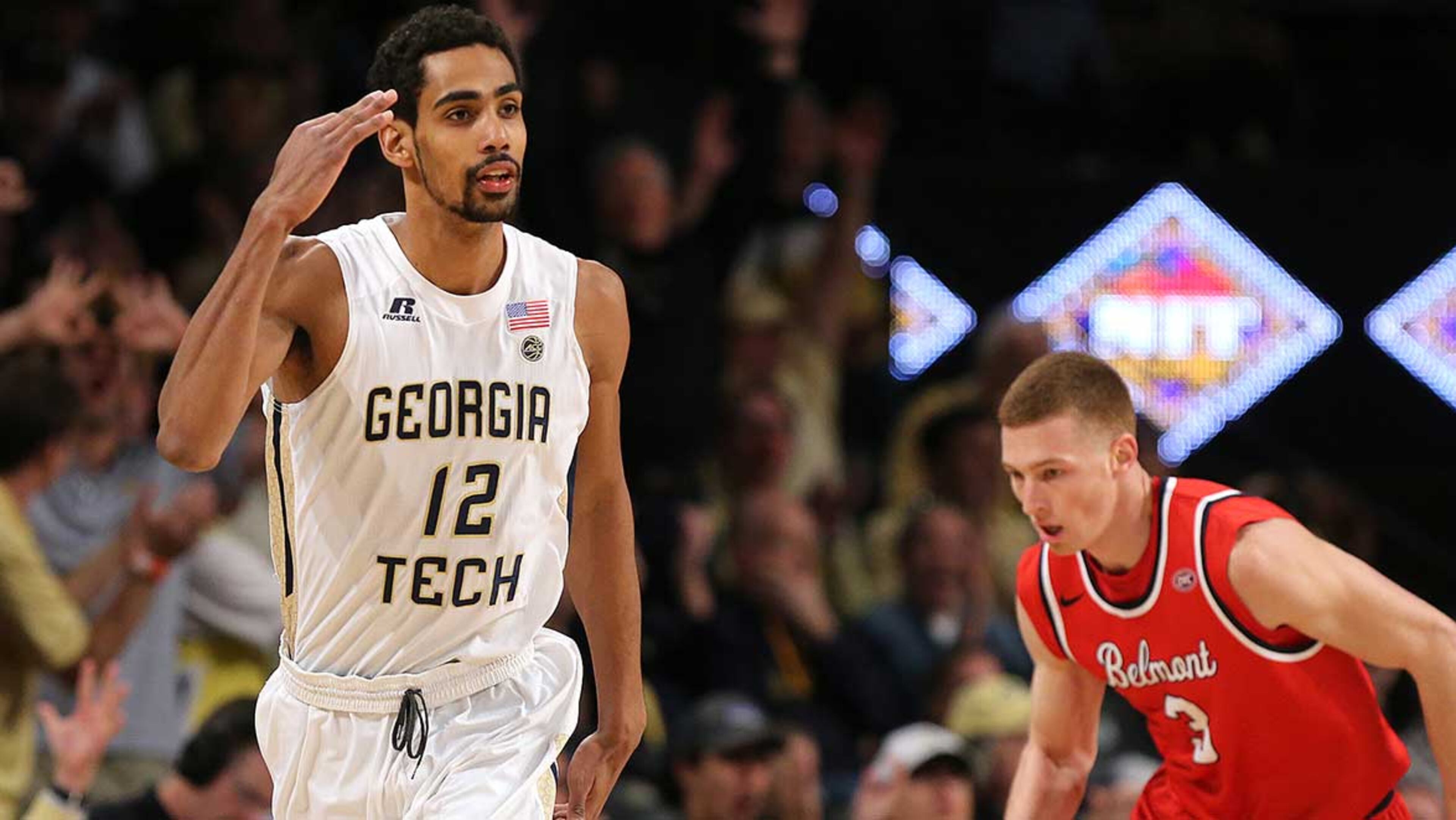 Georgia Tech's Quinton Stephens salutes after making a three-pointer over salutes after making a three pointer against Belmont's Dylan Windler during the first half of Sunday's game in Atlanta.