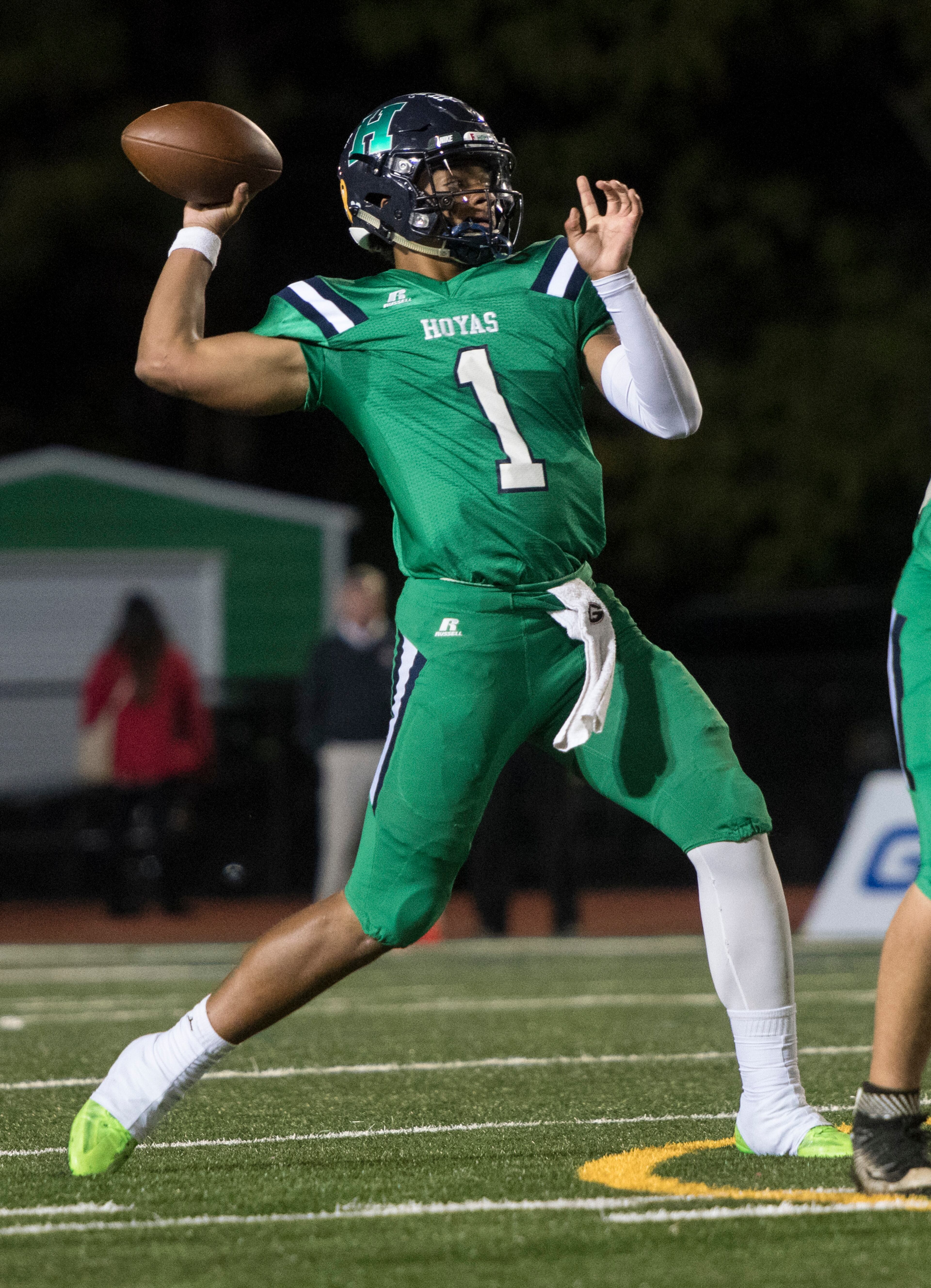 Harrison quarterback Justin Fields (1) passes against Dalton during a high school football game on Thursday, Oct. 19, 2017, in Kennesaw, Ga. (Special to the Atlanta Journal-Constitution, John Amis )