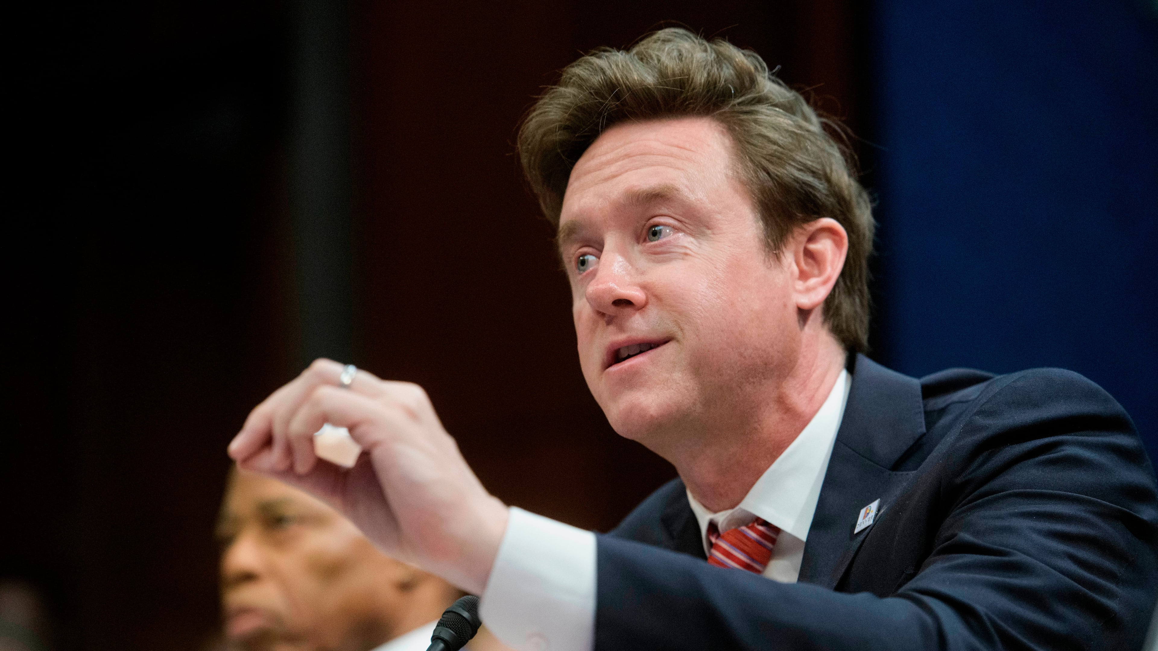 FILE - Denver Mayor Mike Johnston responds to questions during a House Committee on Oversight and Government Reform hearing with Sanctuary City Mayors on Capitol Hill, March 5, 2025, in Washington. (AP Photo/Rod Lamkey, Jr., File)