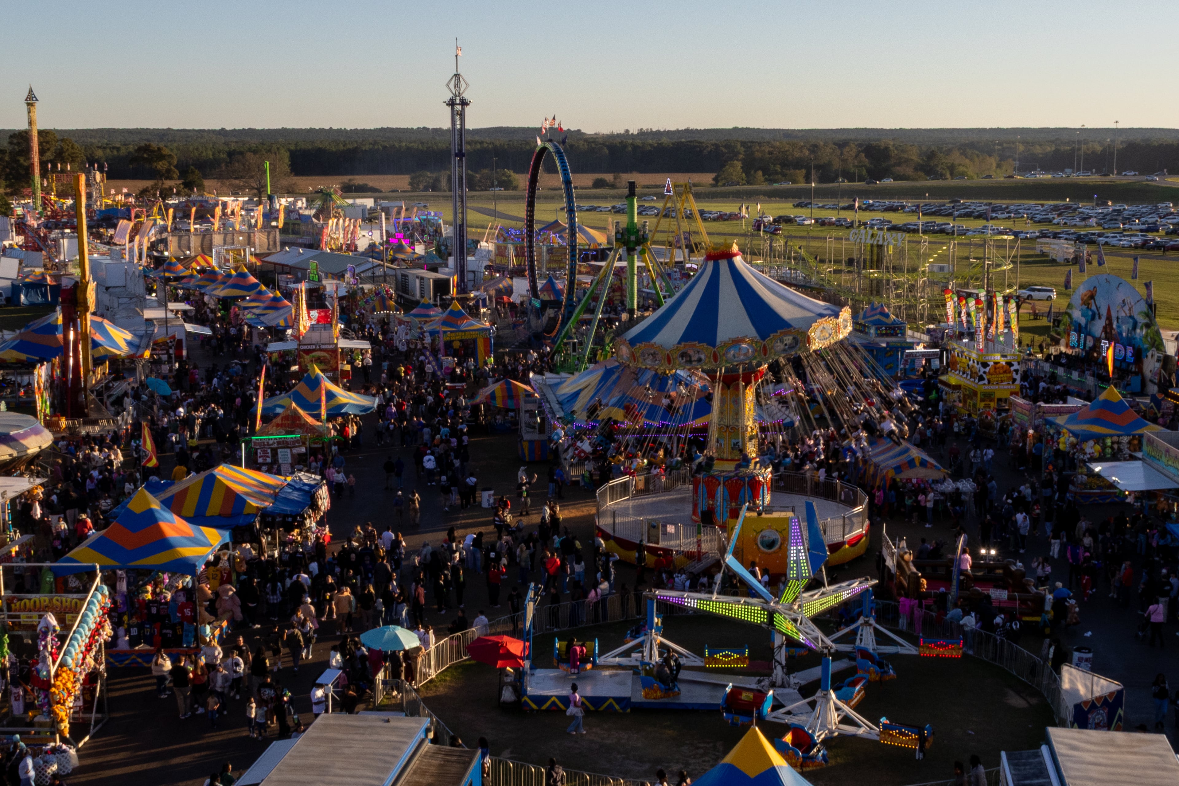 The sun sets at the 37th annual Georgia National Fair on Saturday, October 17, 2026. (Wesley Webb/UGA Photojournalism Workshop)