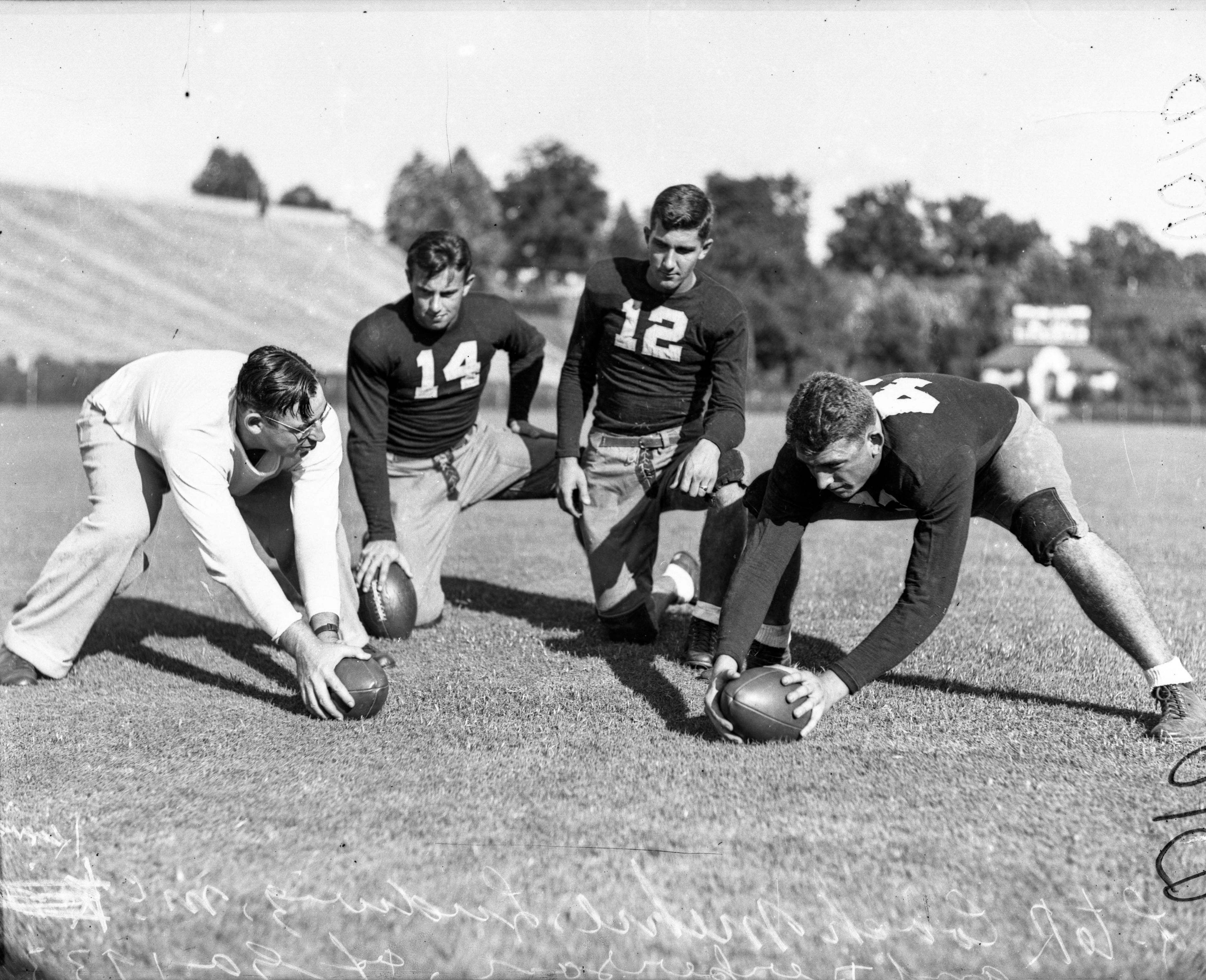 University of Georgia football team practicing, Athens, Georgia, 1933. LBGlass - 021, Lane Brothers Commercial Photographers Photographic Collection, 1920-1976. Photographic Collection, Special Collections and Archives, Georgia State University Library.