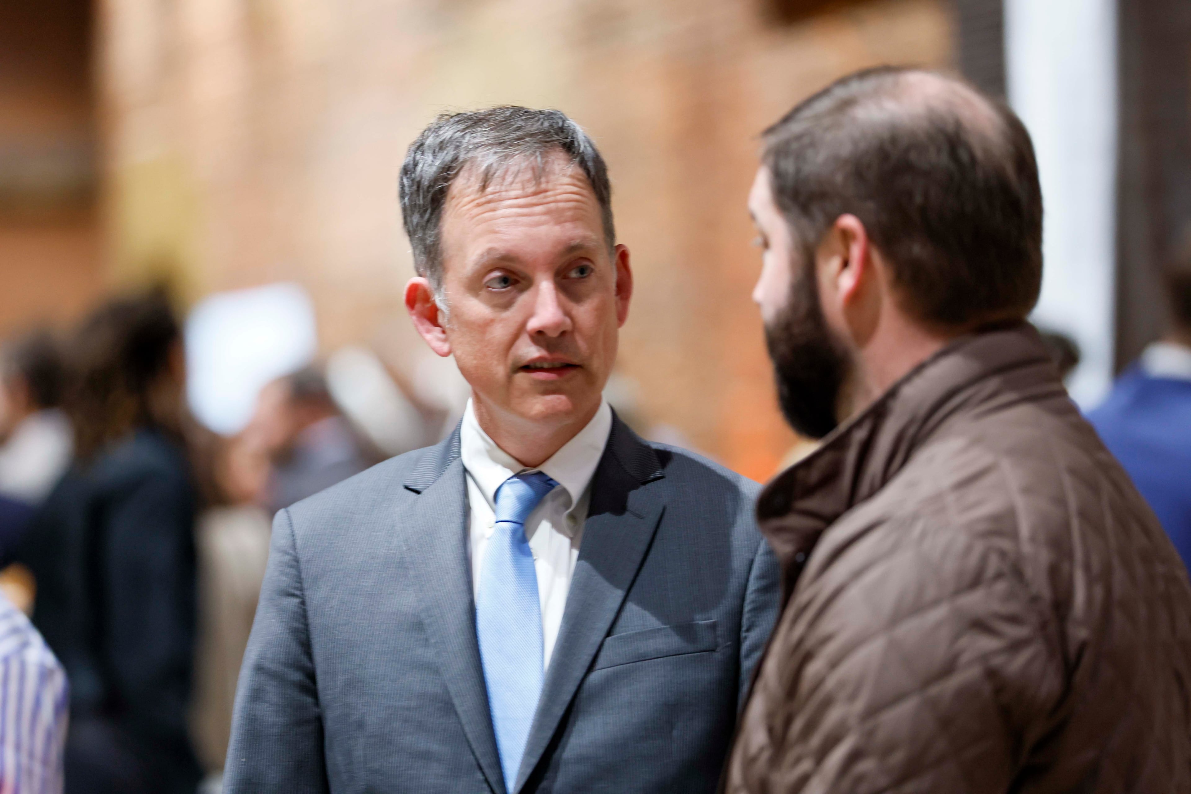 Former Minority Leader and state Rep. Bob Trammell chats with an attendee at the event. (Miguel Martinez/AJC)