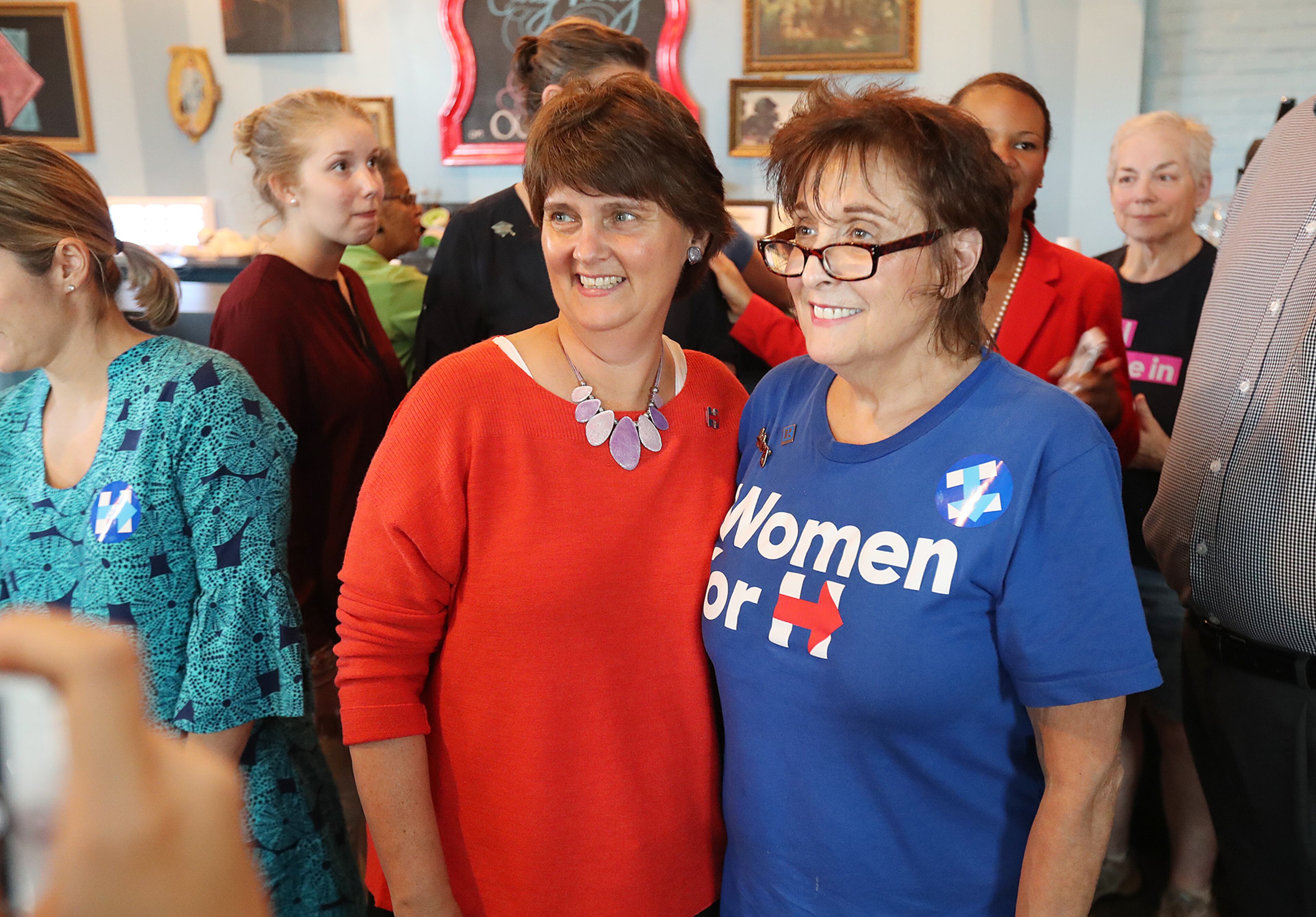 Anne Holton, wife of Democratic vice presidential nominee Tim Kaine, poses for a photograph with volunteer Suzie Perlstein during a campaign stop at a phone banking event for Hillary Clinton at Amelie's French Bakery on Wednesday, Sept. 21, 2016, in Atlanta. Curtis Compton /ccompton@ajc.com
