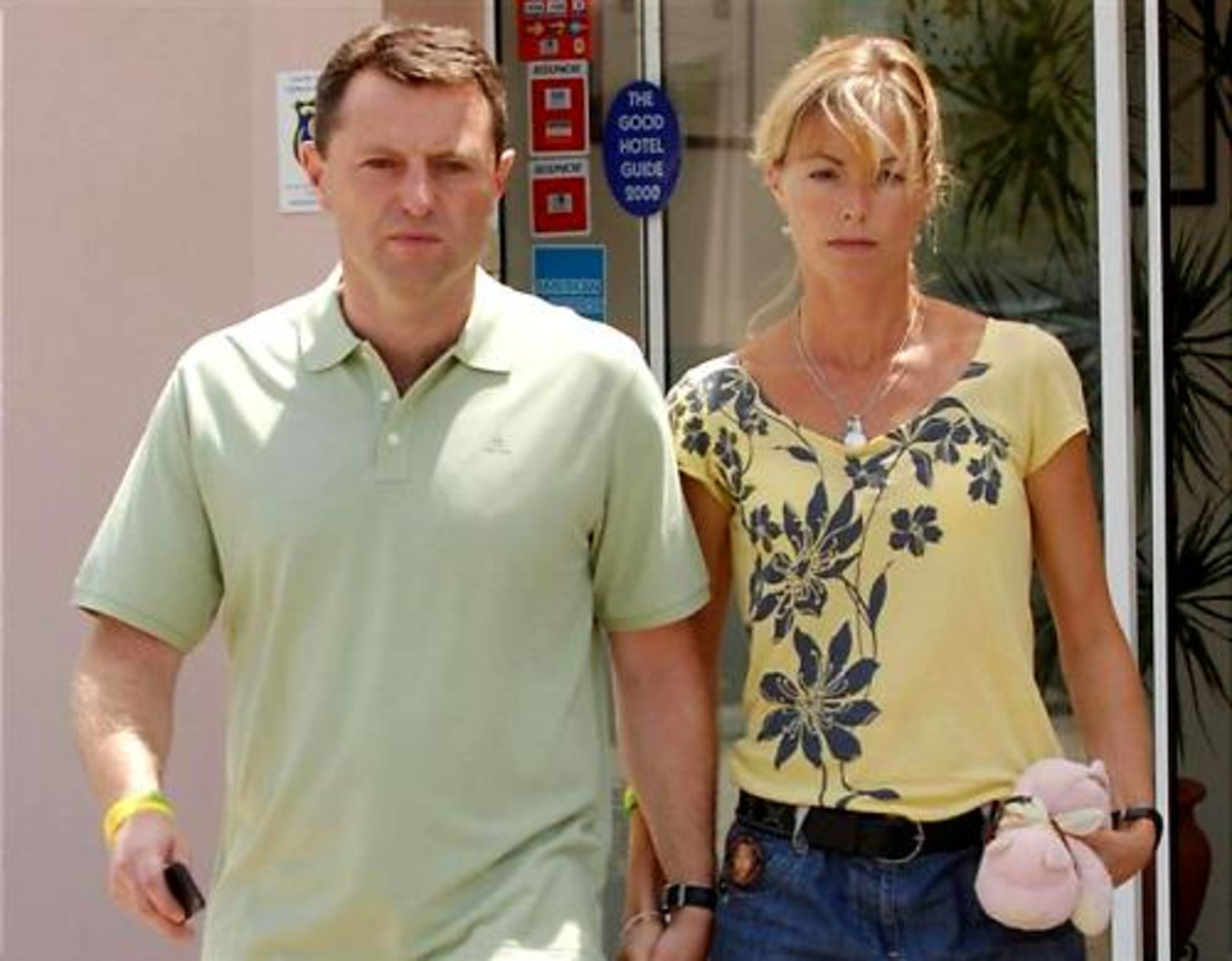 Gerry and Kate McCann, the parents of missing British girl Madeleine McCann leave a hotel on their way to a TV interview, in Praia da Luz, southern Portugal, Thursday, Aug. 9, 2007. The parents of a British girl who disappeared four months ago are to be named formal suspects in the case Friday Sept. 7, 2007, a family spokesman and a family friend said, a shocking twist to a case that has drawn international attention.