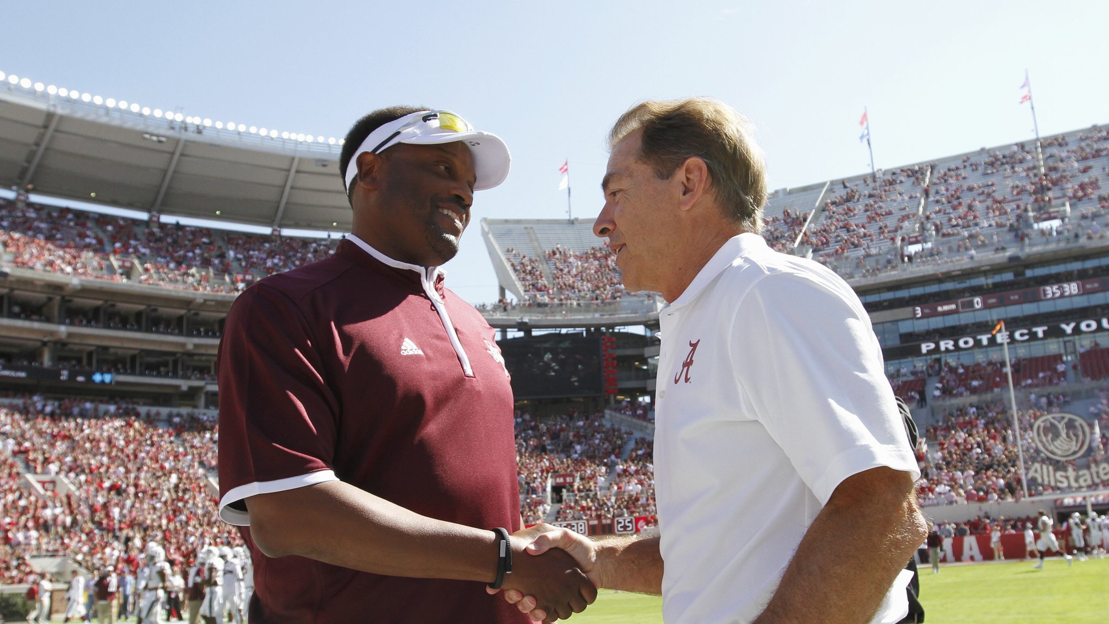 Texas A&M coach Kevin Sumlin (left) and Alabama coach Nick Saban have their teams in the top four of this week’s College Football Playoff rankings. Alabama is ranked No. 1 and A&M No. 4. (AP Photo/Butch Dill, File)