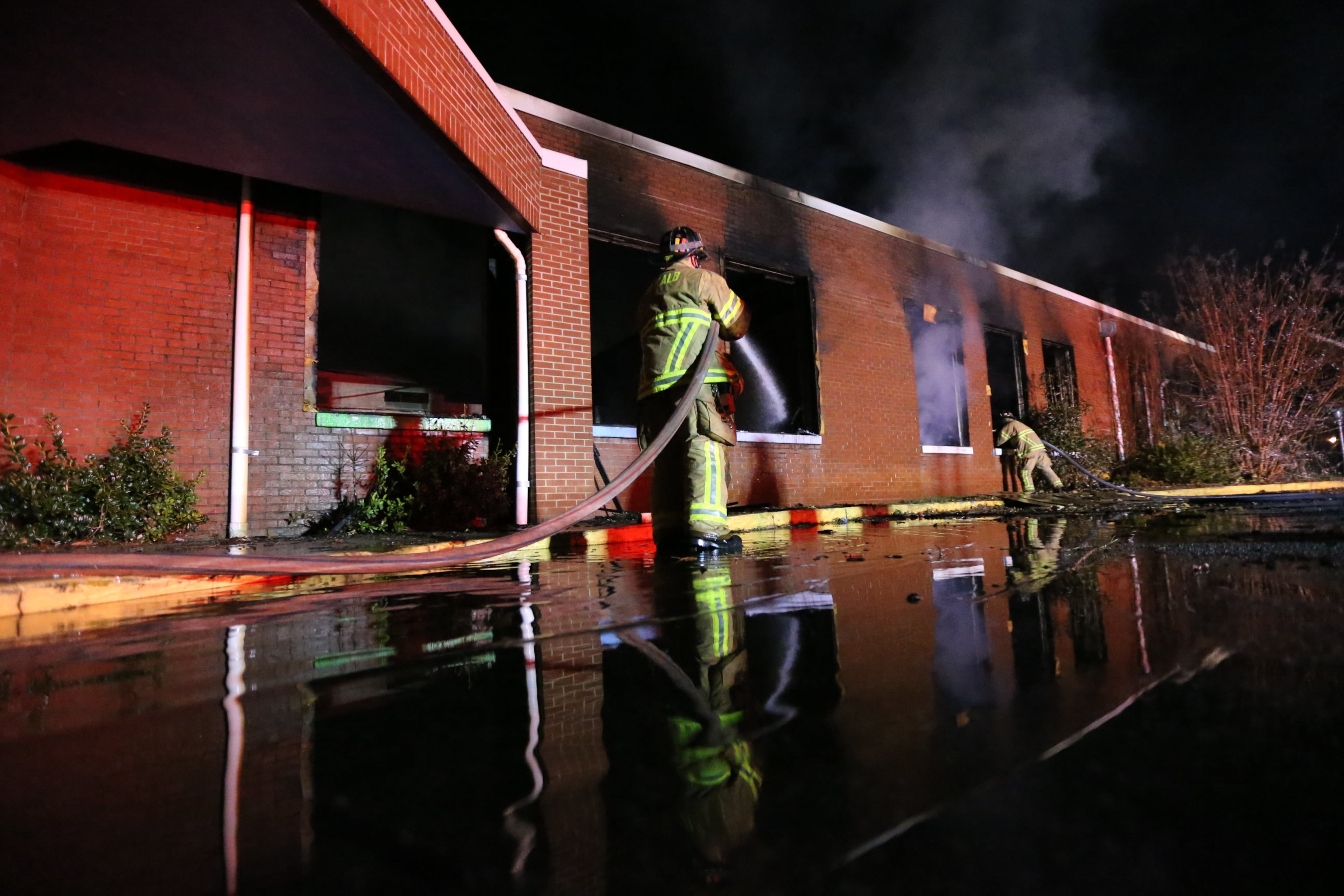 Fire broke out around 2:45 a.m. in the former Hooper Alexander Elementary School on Memorial Drive at Rupert Drive in DeKalb. The school closed in 2008, and was boarded up.