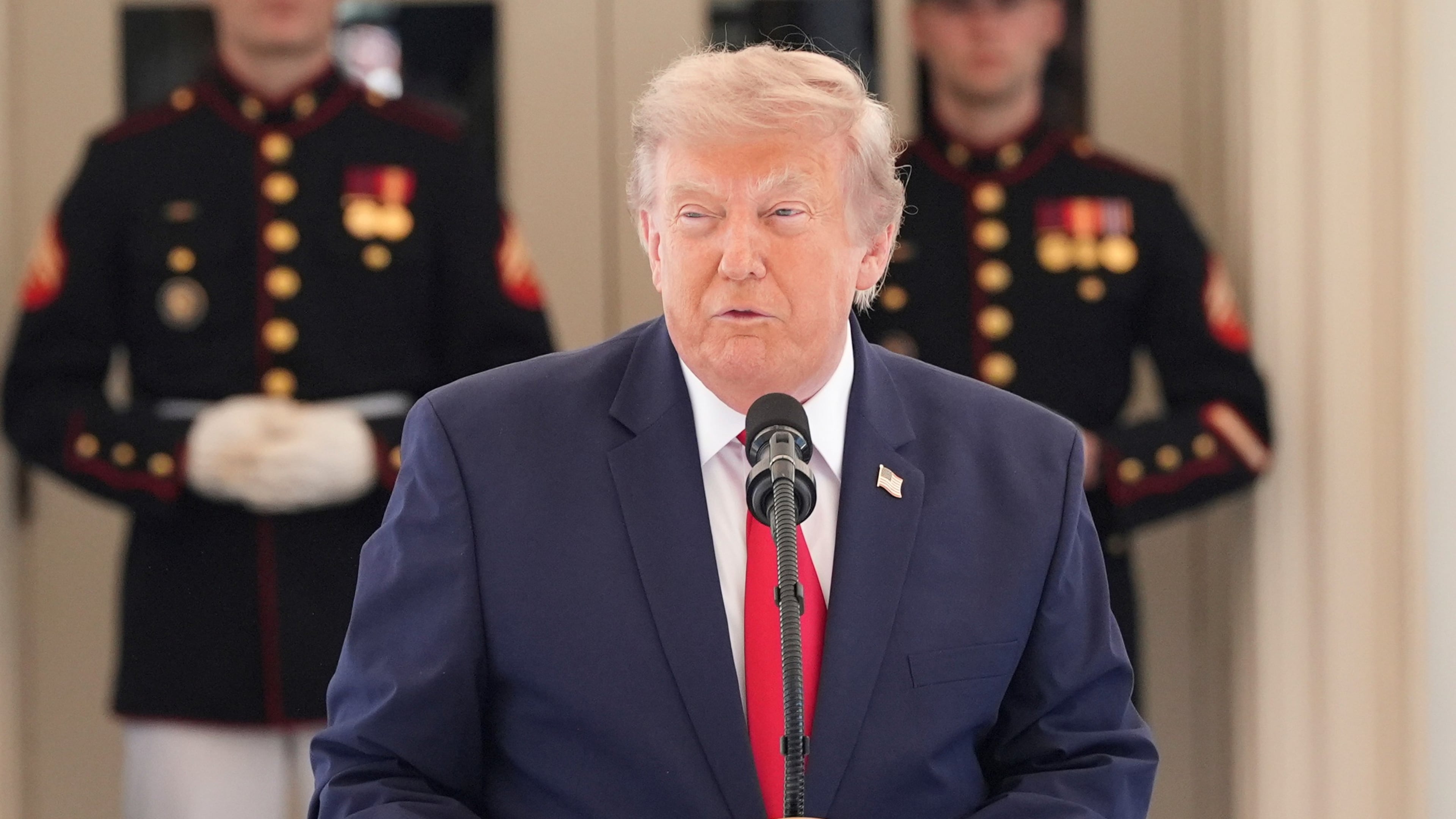 President Donald Trump speaks on West Executive Drive at the White House during a showcase for the upcoming Freedom 250 Grand Prix auto race, Monday, July 13, 2026, in Washington. (AP Photo/Alex Brandon)