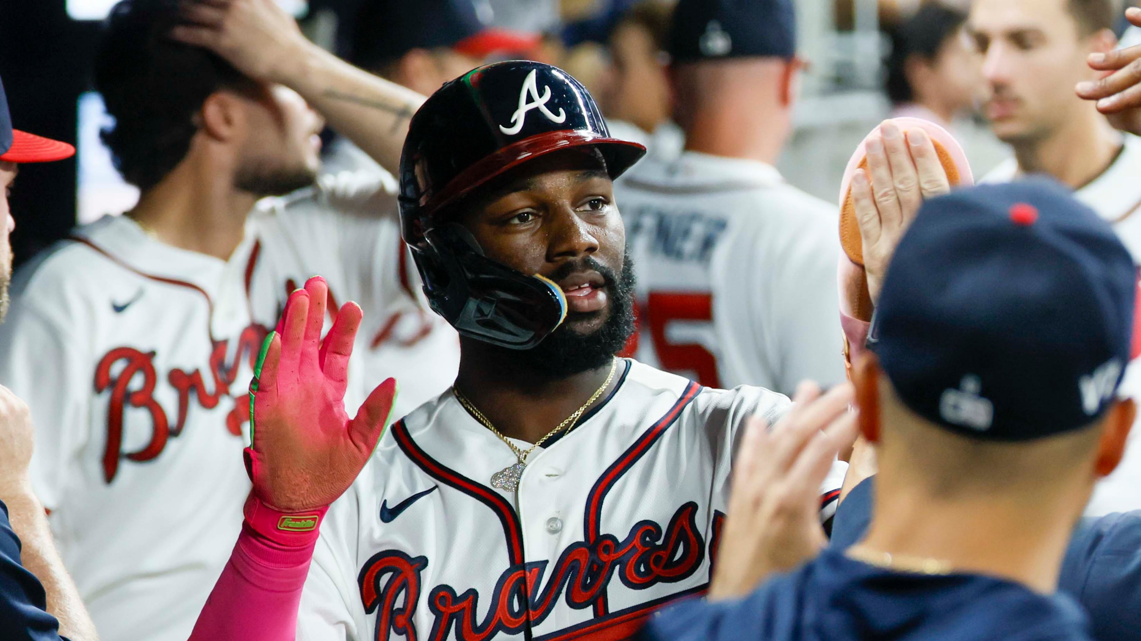 Atlanta Braves center fielder Michael Harris II (23) celebrates in the dugout after scoring on a double by Atlanta Braves center fielder Lane Thomas (20) during the sixth inning against the Miami Marlins on Thursday, August 6, 2026, at Truist Park in Atlanta.
(Miguel Martinez/ AJC)