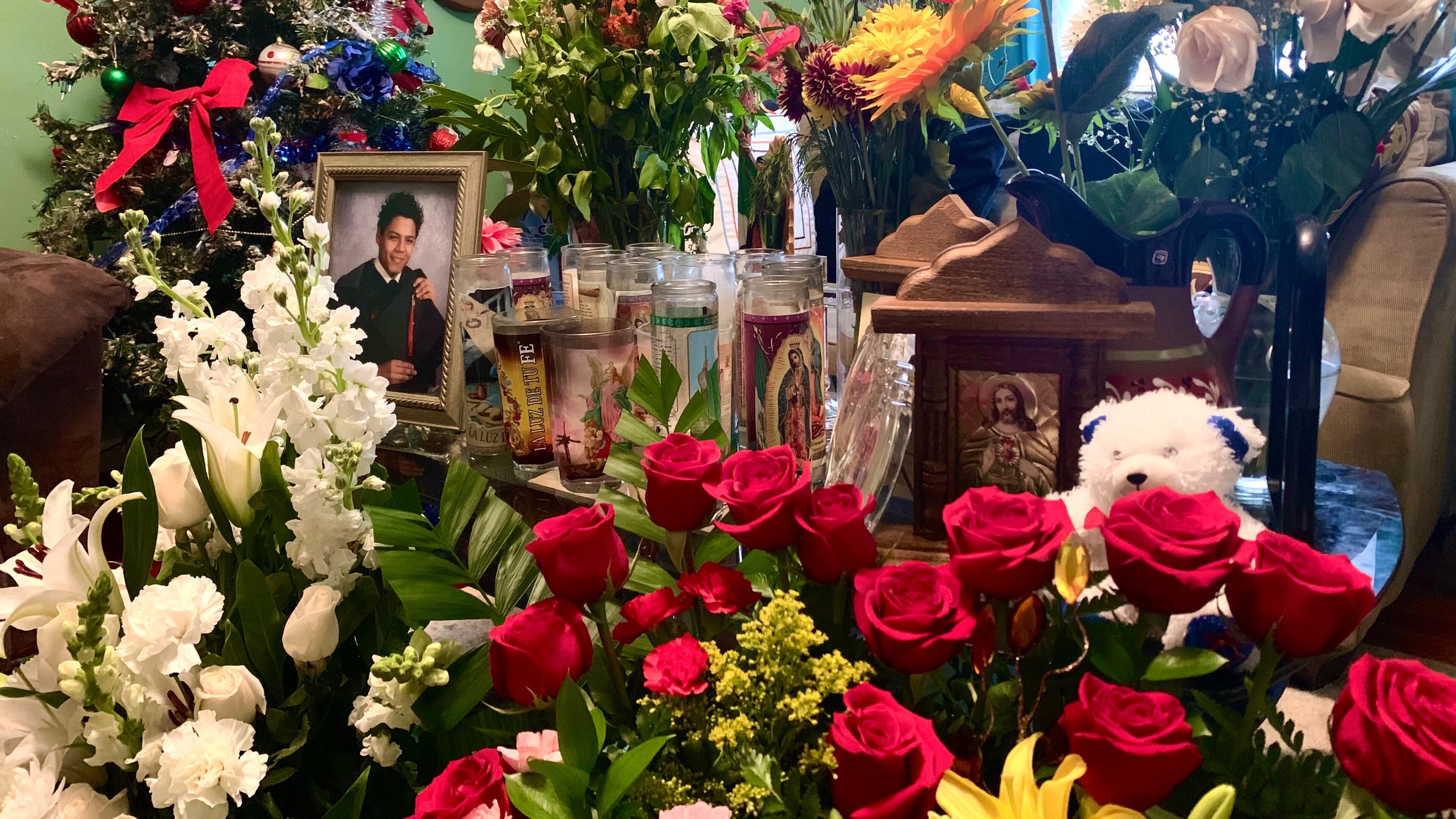 The entry of Yessica Lopez's parents' home has become a memorial of sorts after her husband, Juan Lopez, died Nov. 26.