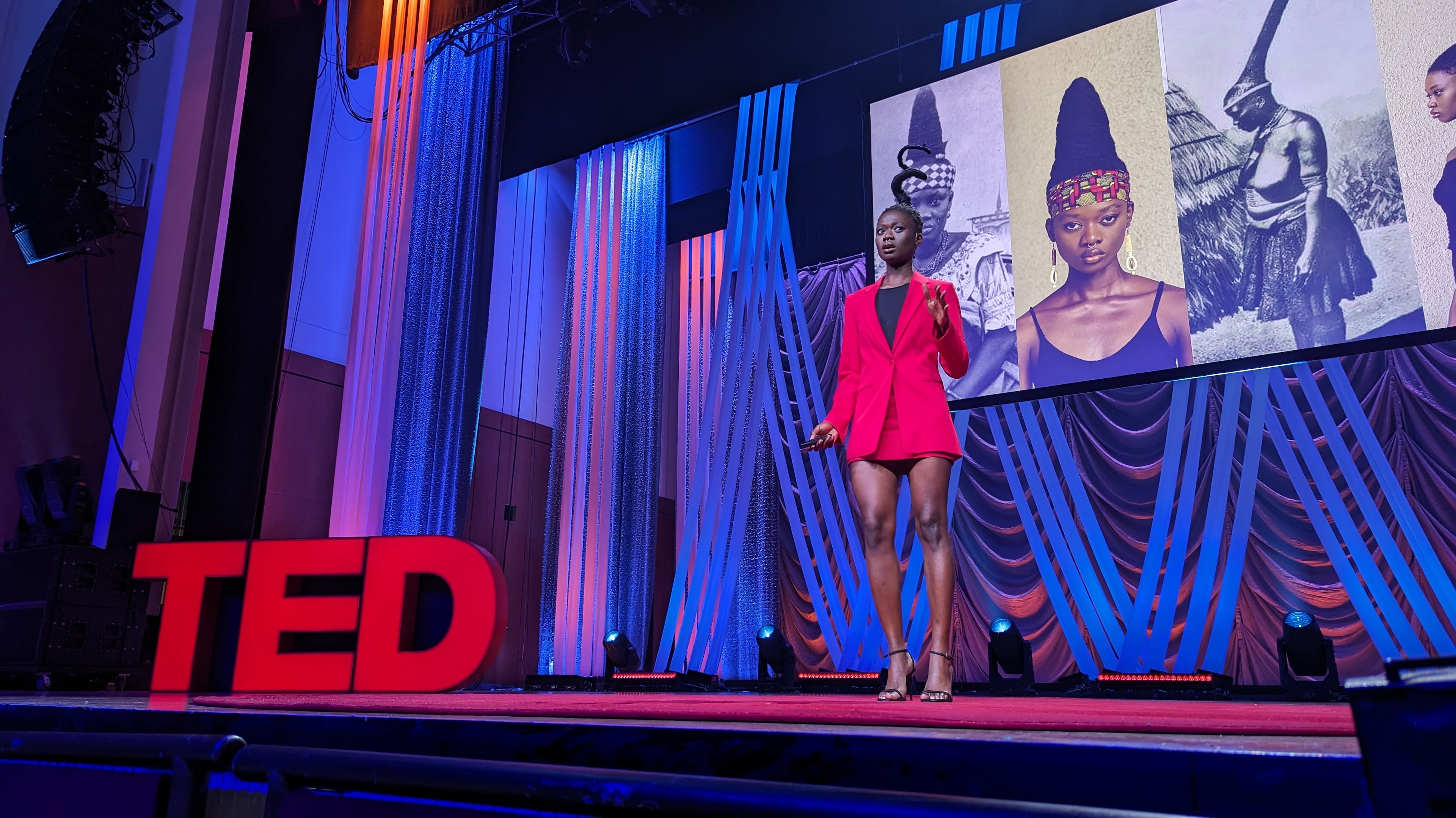 Laetitia Ky, an artist from the Ivory Coast who sculpts her hair, speaks at TEDWomen at the Woodruff Arts Center on Thursday, October 12. Mirtha Donastorg/AJC