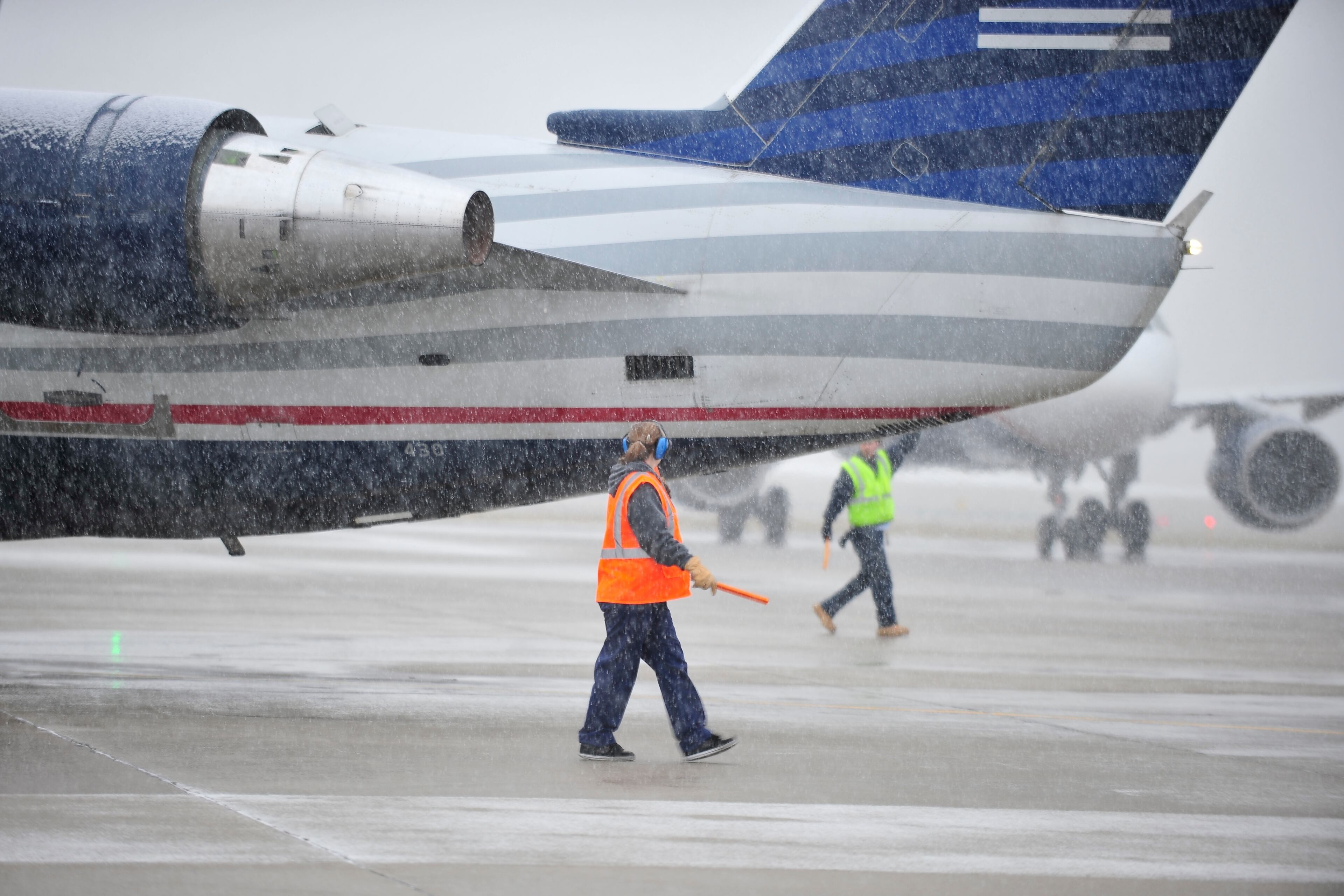 Aircraft diverted from the Philadelphia International Airport lineup on the ramp at Lehigh Valley International Airport Sunday, December 8, 2013 in Allentown, PA. Heavy snow and icing conditions forced the aircraft to divert from landing at Philadelphia. (AP Photo/Chris Post)