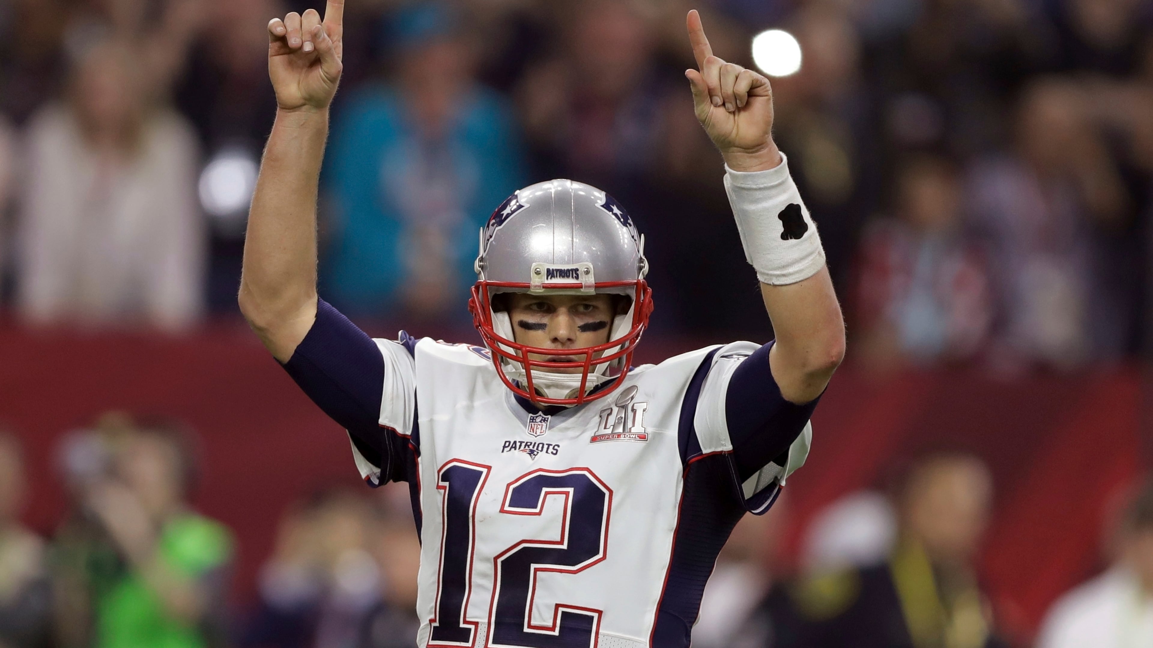 New England Patriots' Tom Brady raises his arms after a touchdown, during the second half of the NFL Super Bowl 51 football game against the Atlanta Falcons, Sunday, Feb. 5, 2017, in Houston. (AP Photo/Darron Cummings)
