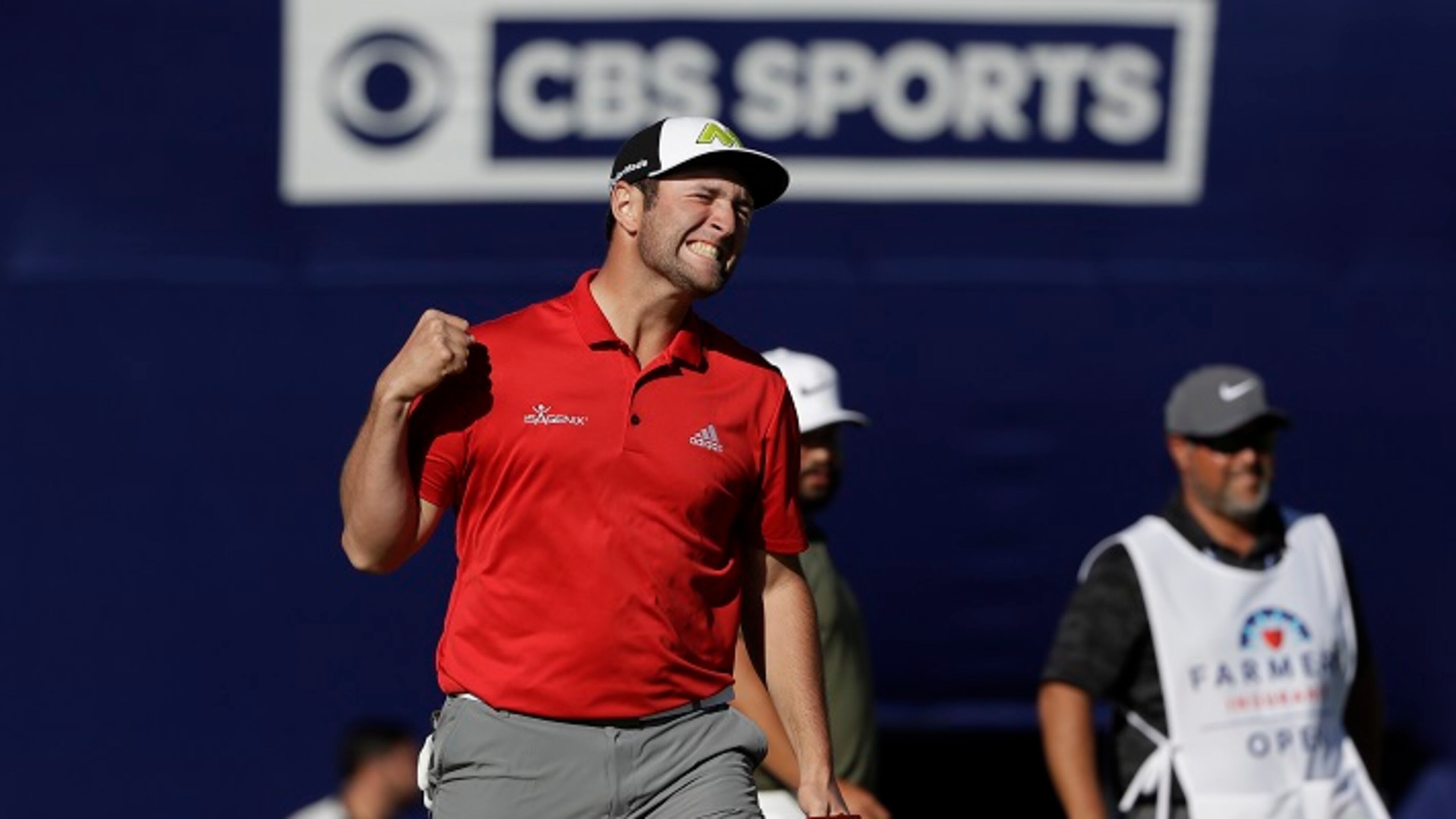 FILE - In this Jan. 29, 2017, file photo, Jon Rahm, of Spain, reacts after making a putt for eagle on the 18th hole of the South Course during the final round of the Farmers Insurance Open golf tournament, at Torrey Pines Golf Course in San Diego. Rahm's 60-foot eagle putt was a defining moment with the putter this year. (AP Photo/Gregory Bull, File)