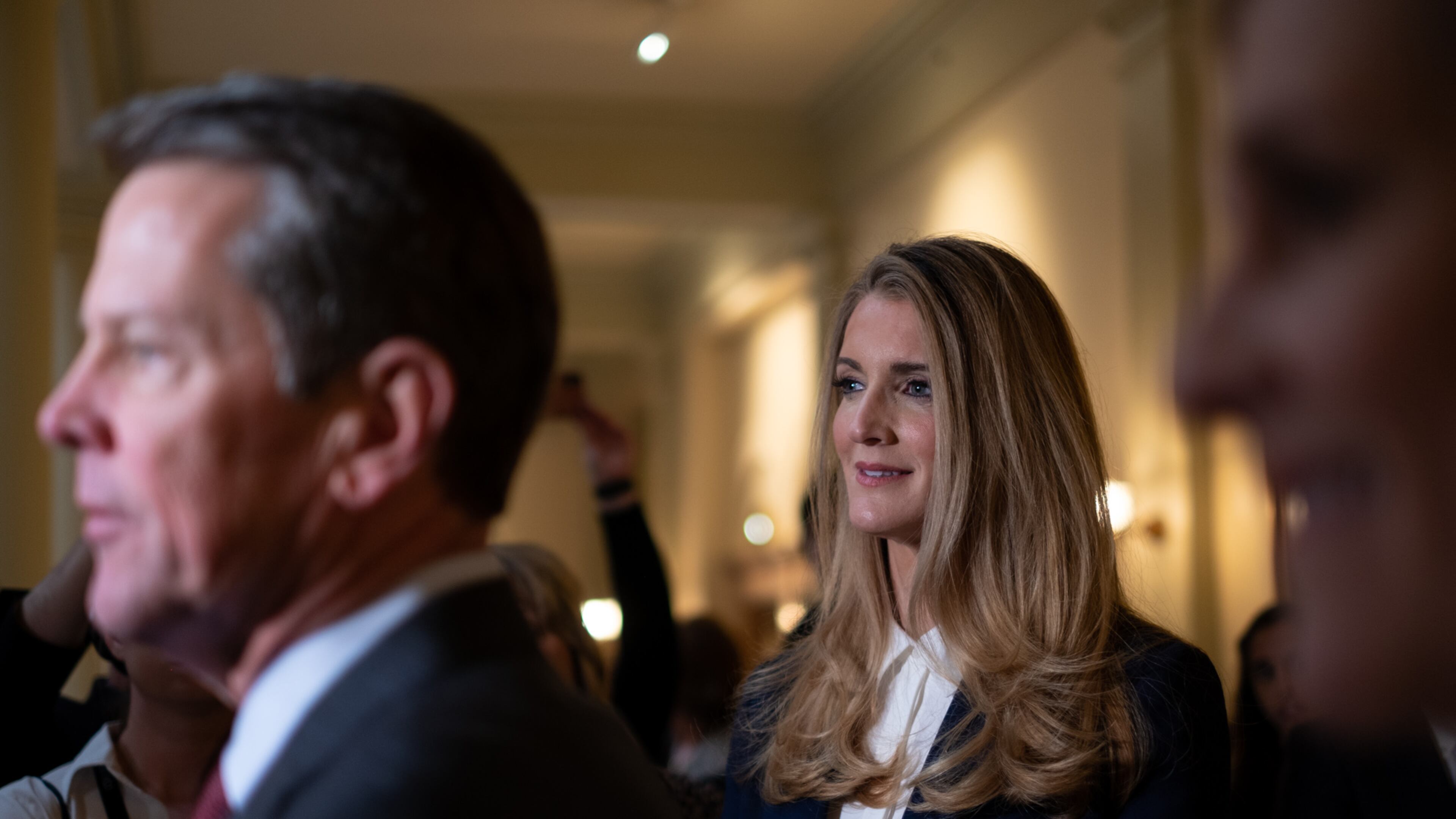 200302-ATLANTA-U.S. Sen. Kelly Loeffler (R-Georgia) is introduced by Gov. Brian Kemp after qualifying to run for the U.S. Senate Monday morning March 2, 2020 at the Georgia State Capitol. BenGray.com / Special