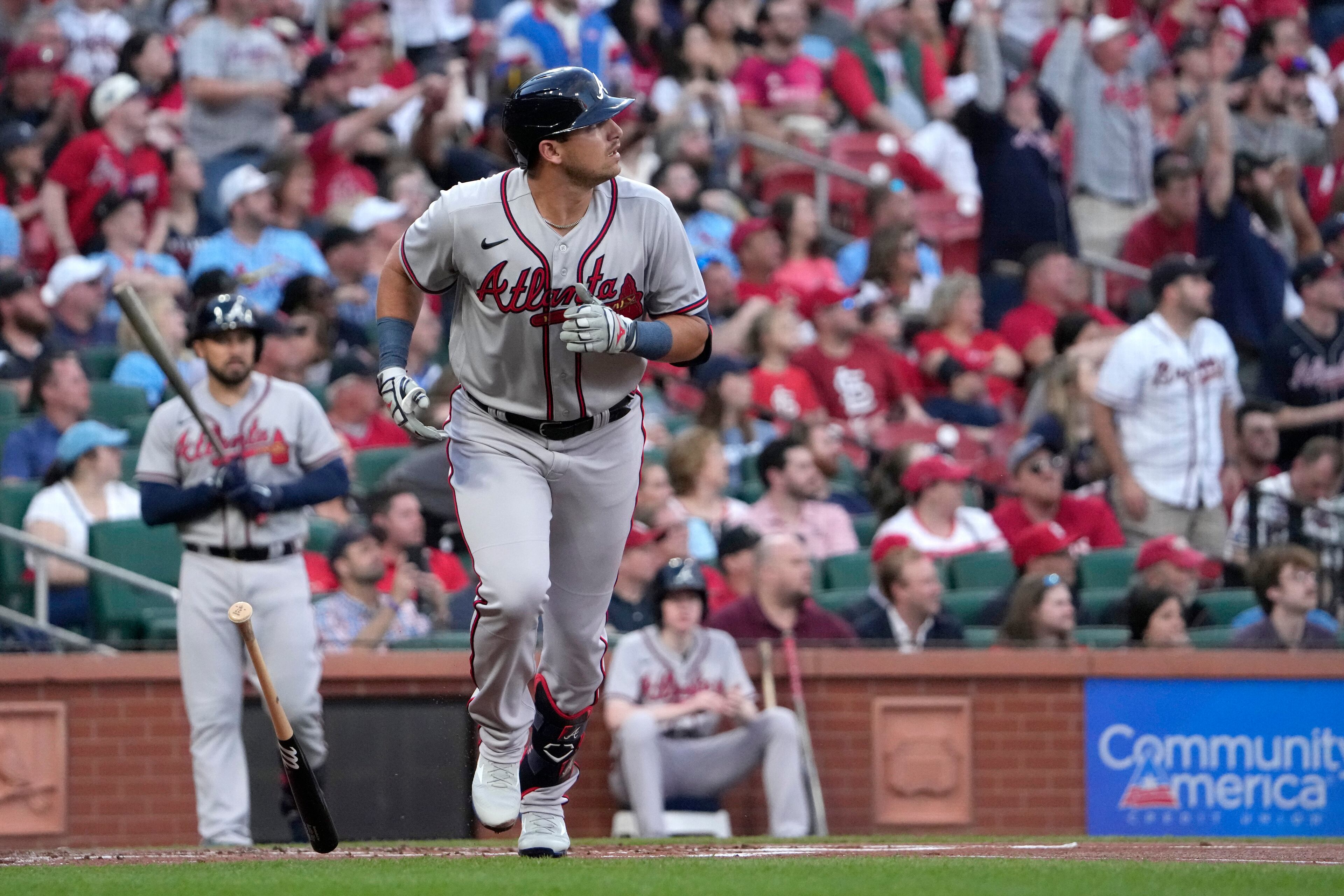 Austin Riley watches his 473-foot solo home run during the first inning of Monday's 8-4 victory over the Cardinals in St. Louis.