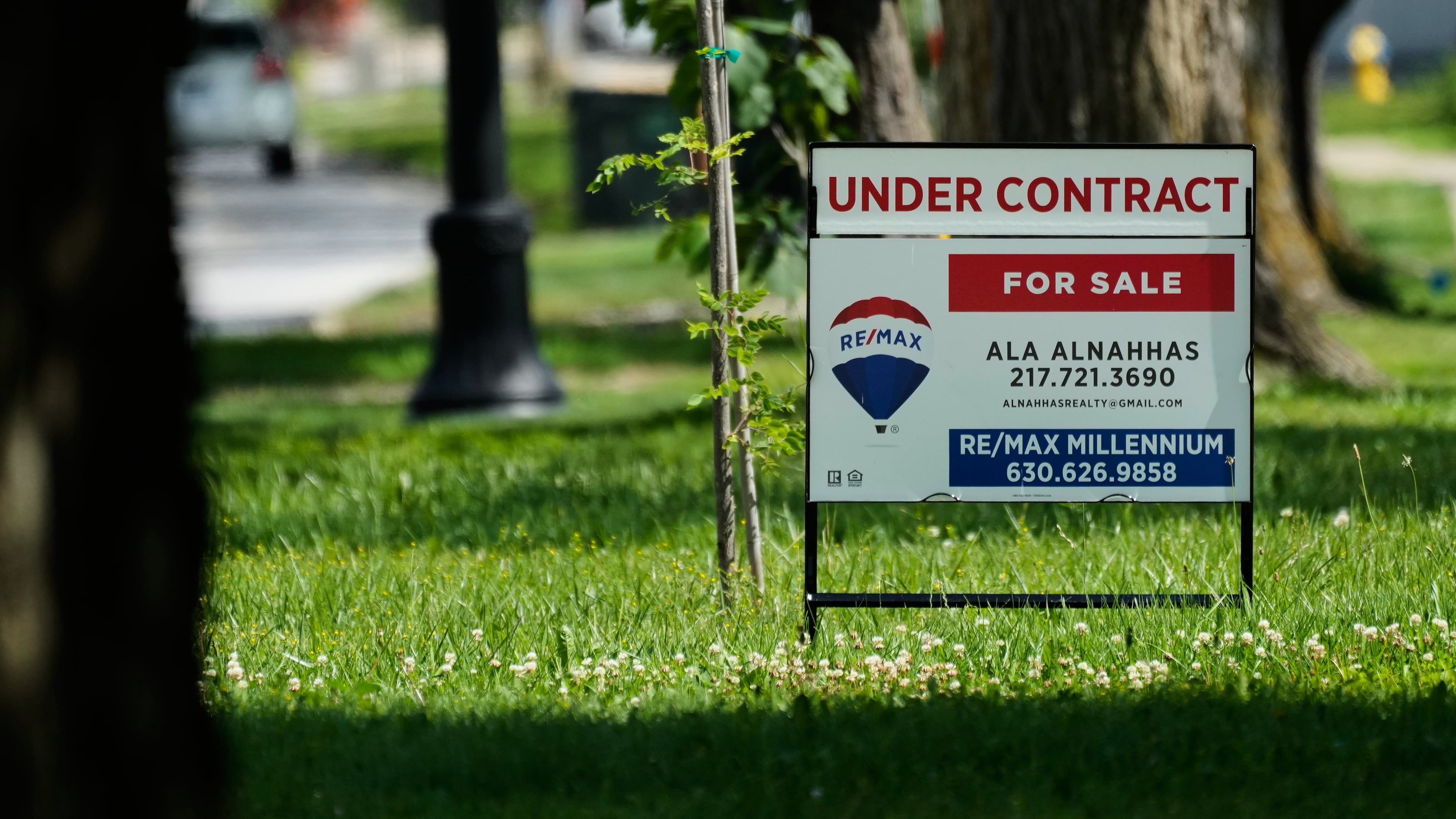 A under contract for home sale sign is seen outside of a home in Niles, Ill., Thursday, June 25, 2026. (AP Photo/Nam Y. Huh)