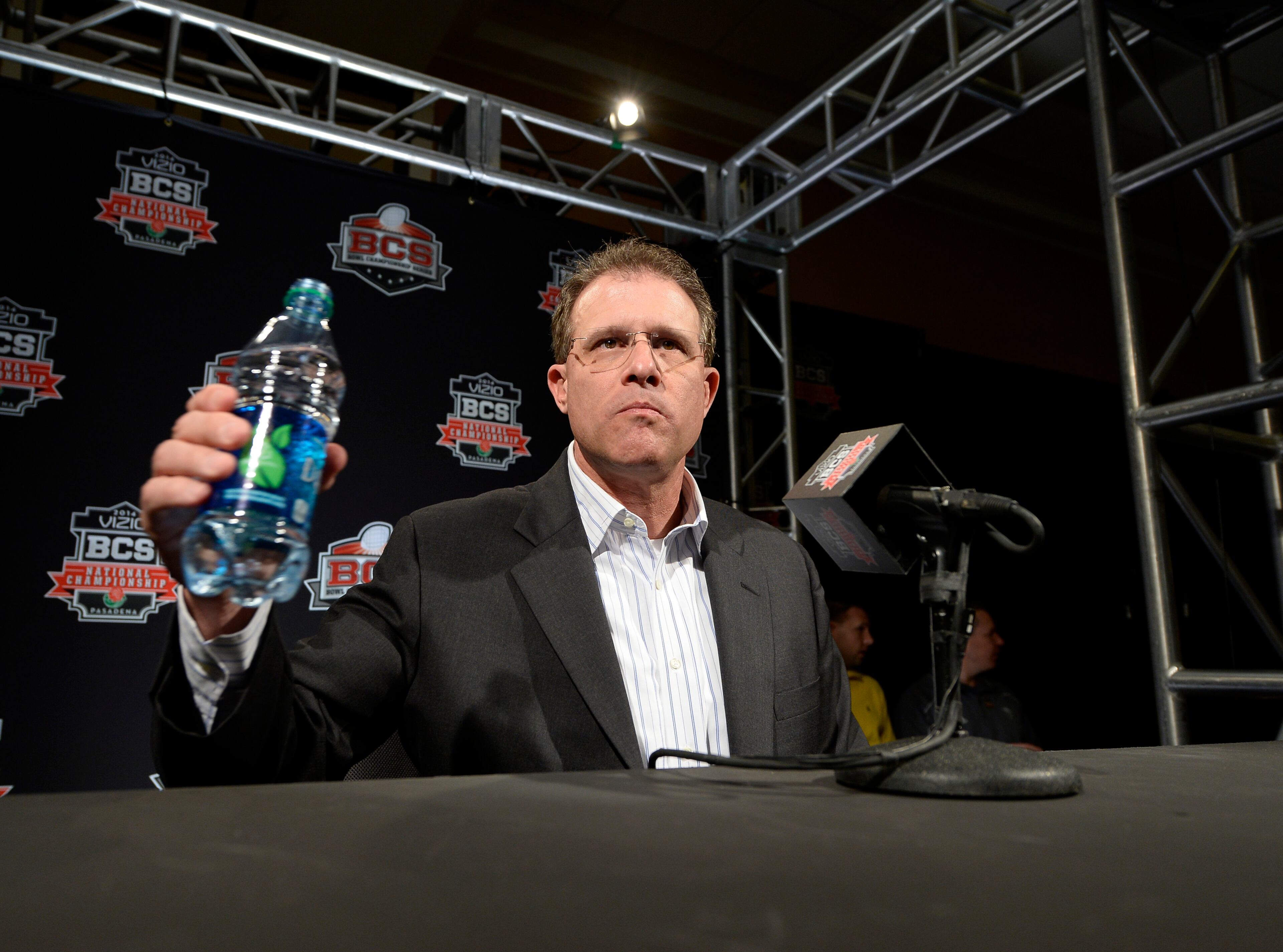 NEWPORT BEACH, CA - JANUARY 4: Head coach Gus Malzhan of the Auburn Tigers speaks during a Vizio BCS National Championship media day news conference January 4, 2014 in Newport Beach, California. (Photo by Kevork Djansezian/Getty Images)