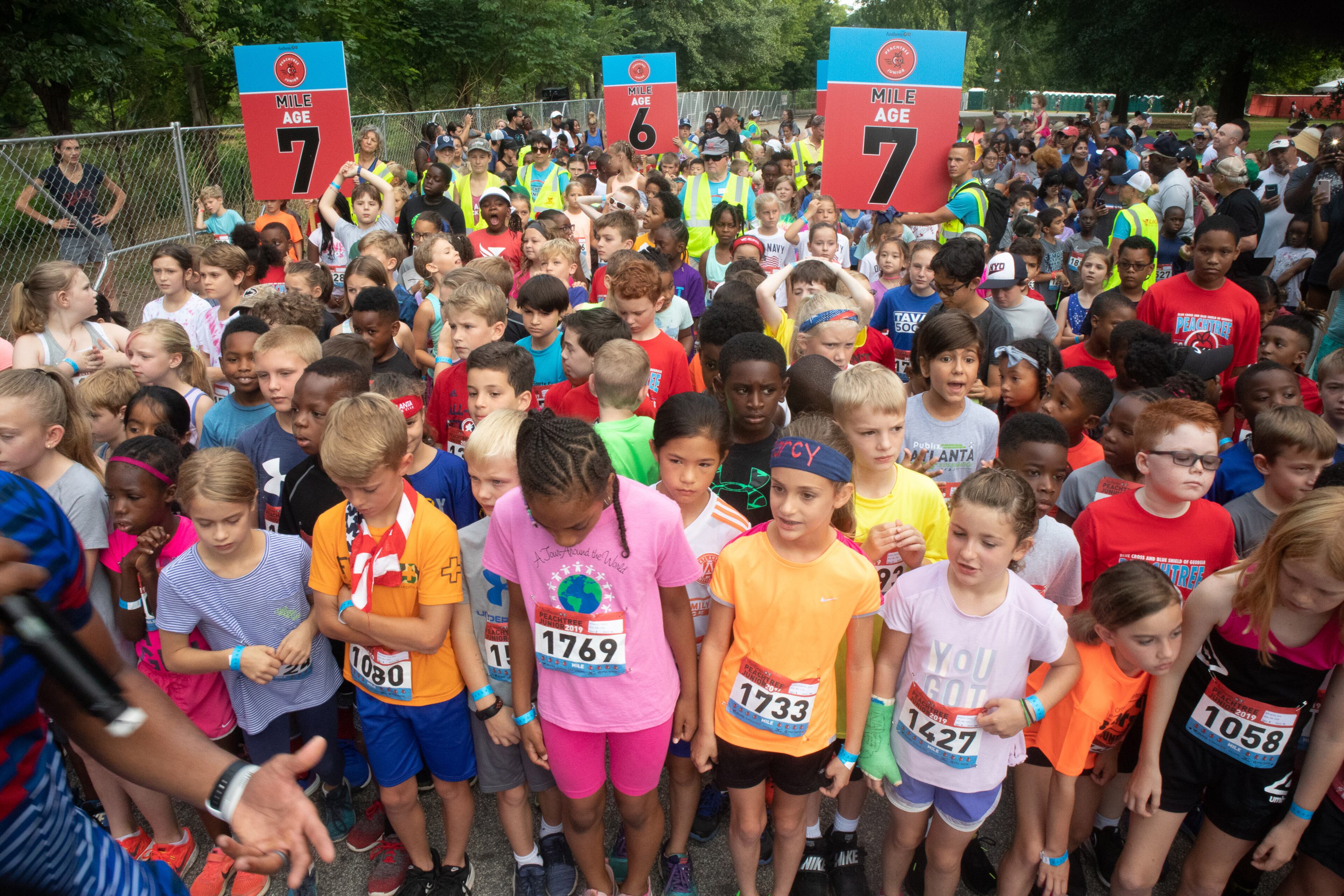 Runners line up on the starting line before the beginning of the one-mile run during The Anthem Peachtree Junior race in Piedmont Park Wednesday, July 3, 2019. STEVE SCHAEFER / SPECIAL TO THE AJC