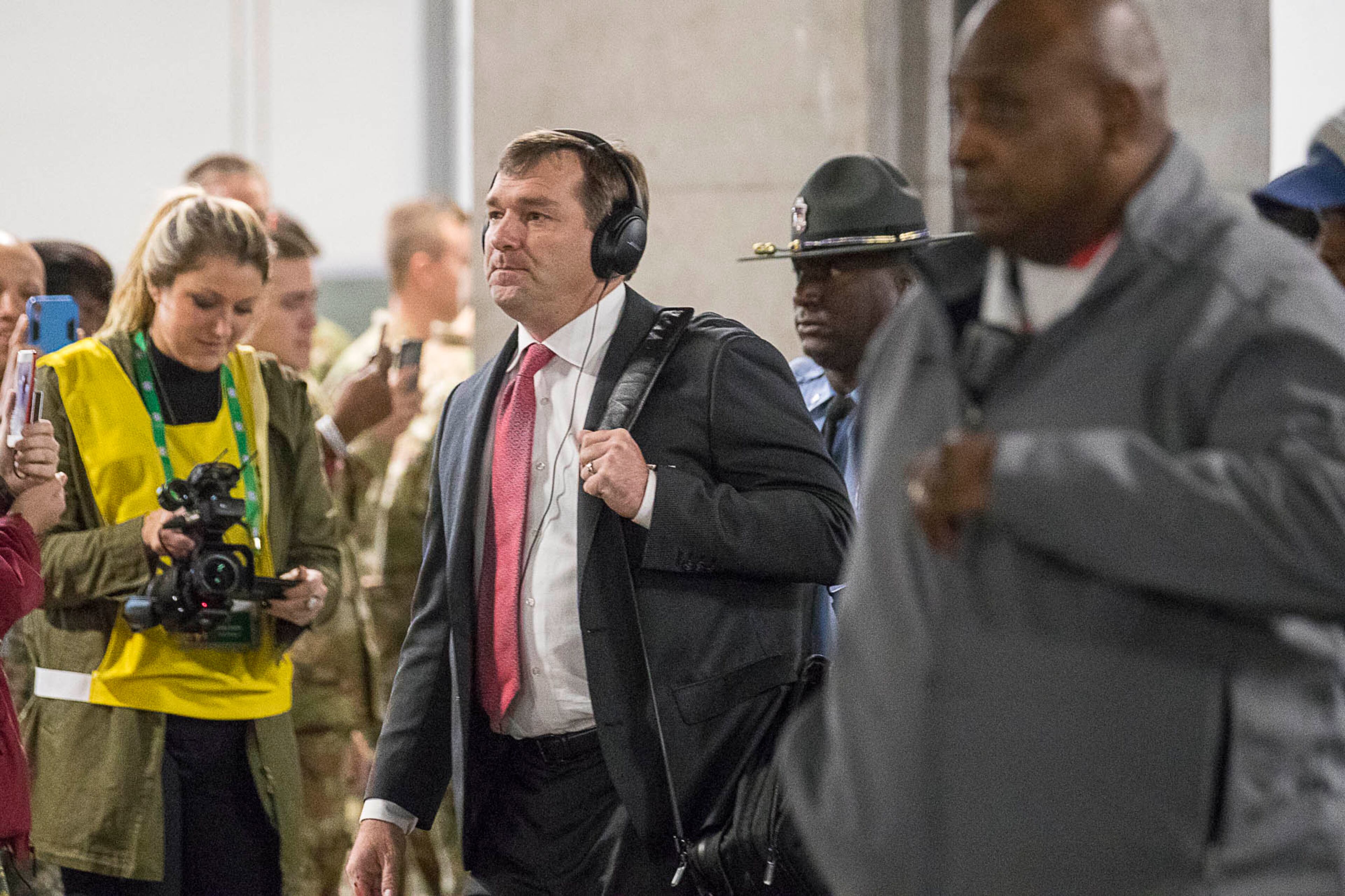 12/01/2018 -- Atlanta, Georgia -- Georgia Bulldogs head coach Kirby Smart arrives at Mercedes-Benz Stadium with his team before the start of the SEC Championship game in Atlanta, Saturday, December 1, 2018. Georgia will play Alabama for the title. (ALYSSA POINTER/ALYSSA.POINTER@AJC.COM)
